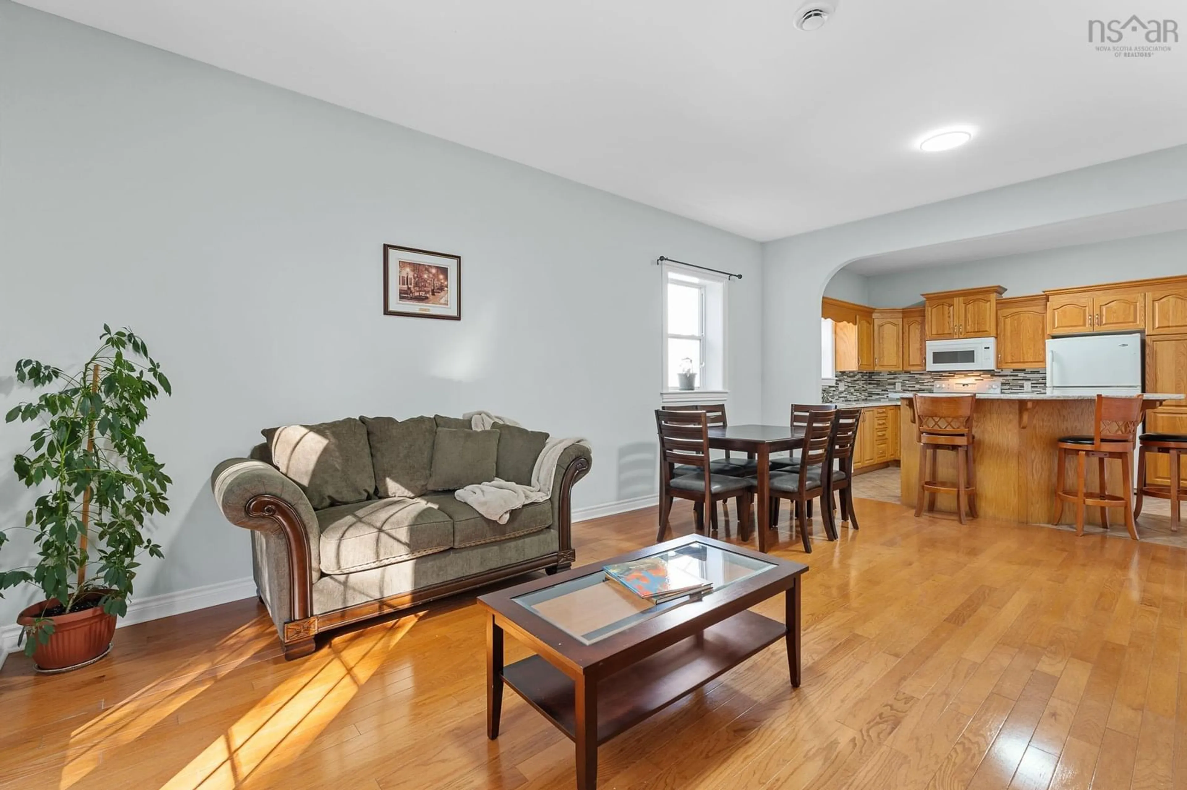 Living room with furniture, wood/laminate floor for 29 Fieldstone St, Spryfield Nova Scotia B3R 2N5