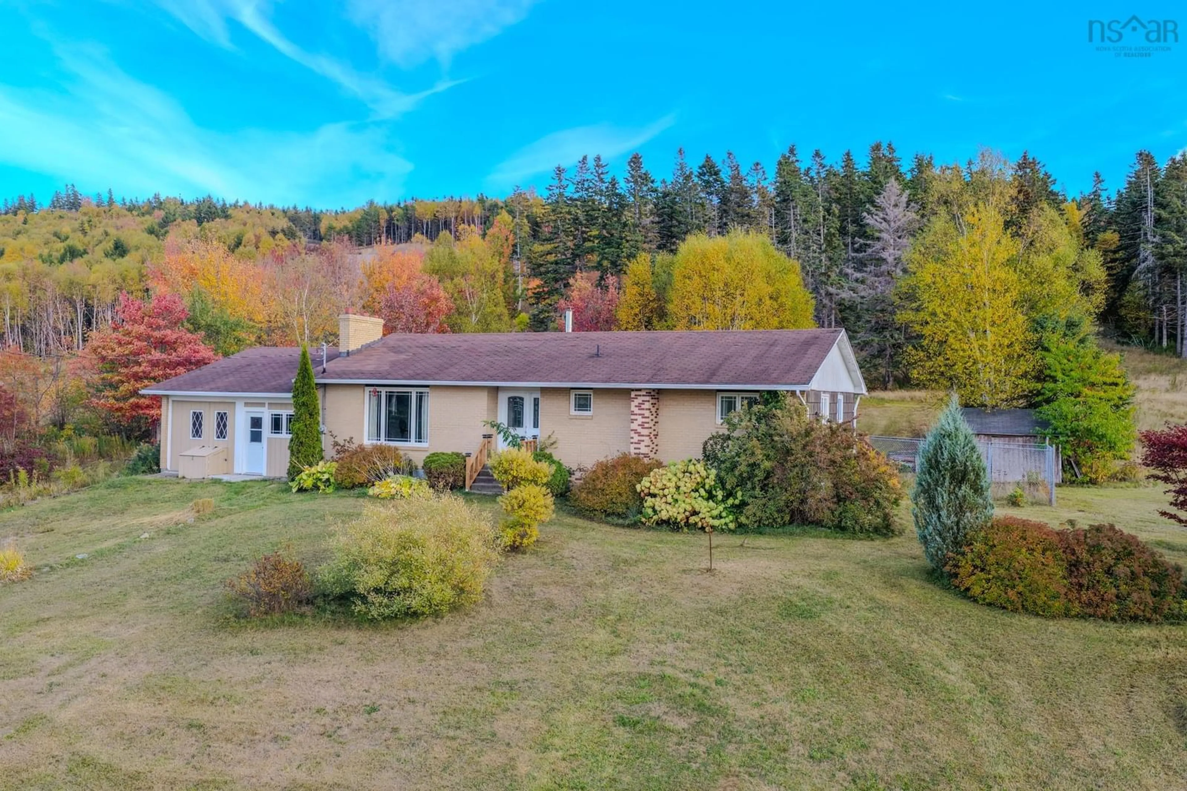 A pic from outside/outdoor area/front of a property/back of a property/a pic from drone, unknown for 7587 East Bay Hwy, Big Pond Nova Scotia B1J 1Y8