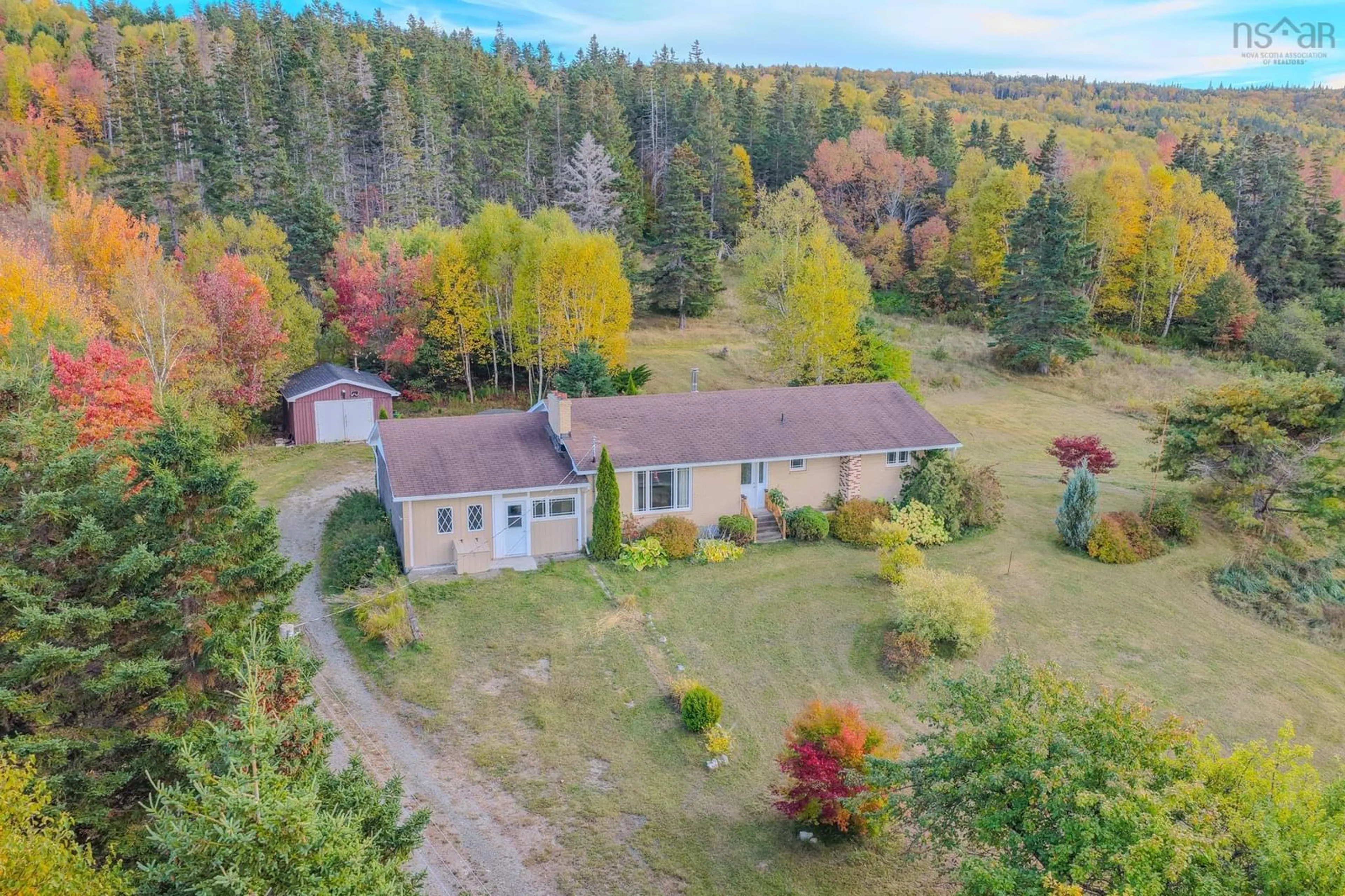 A pic from outside/outdoor area/front of a property/back of a property/a pic from drone, forest/trees view for 7587 East Bay Hwy, Big Pond Nova Scotia B1J 1Y8