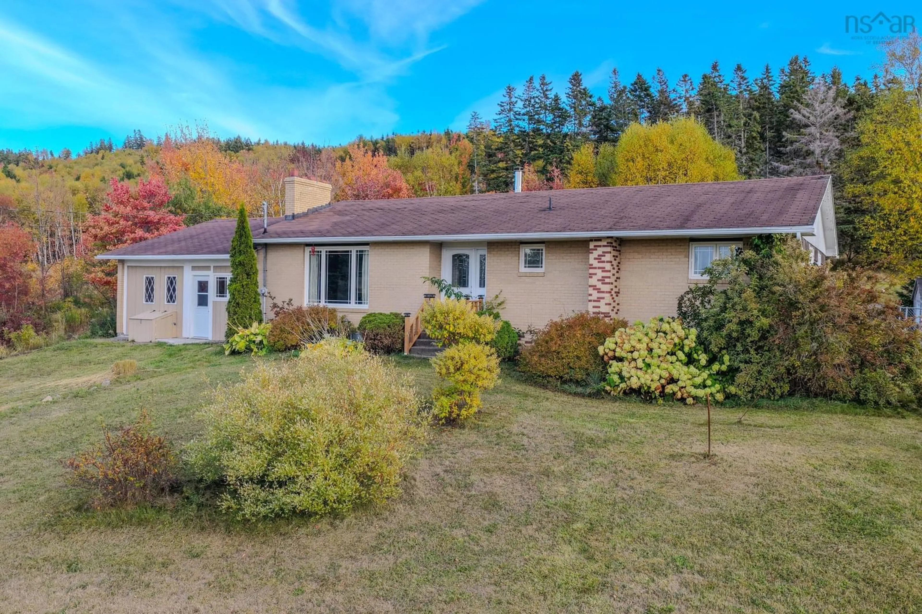 A pic from outside/outdoor area/front of a property/back of a property/a pic from drone, unknown for 7587 East Bay Hwy, Big Pond Nova Scotia B1J 1Y8