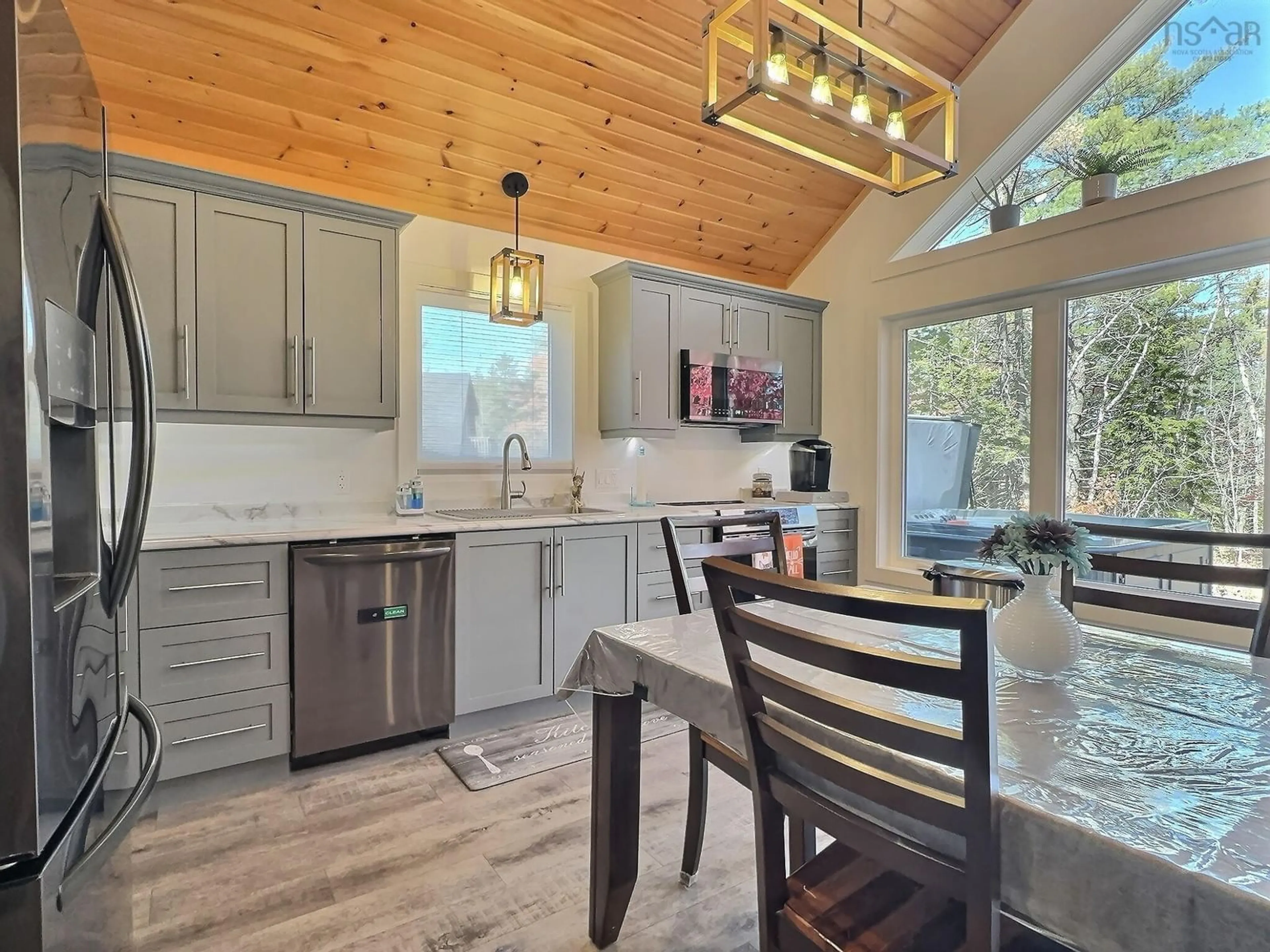 Open concept kitchen, wood/laminate floor for 281 Meek Arm Trail #53, Mount Uniacke Nova Scotia B0N 1Z0