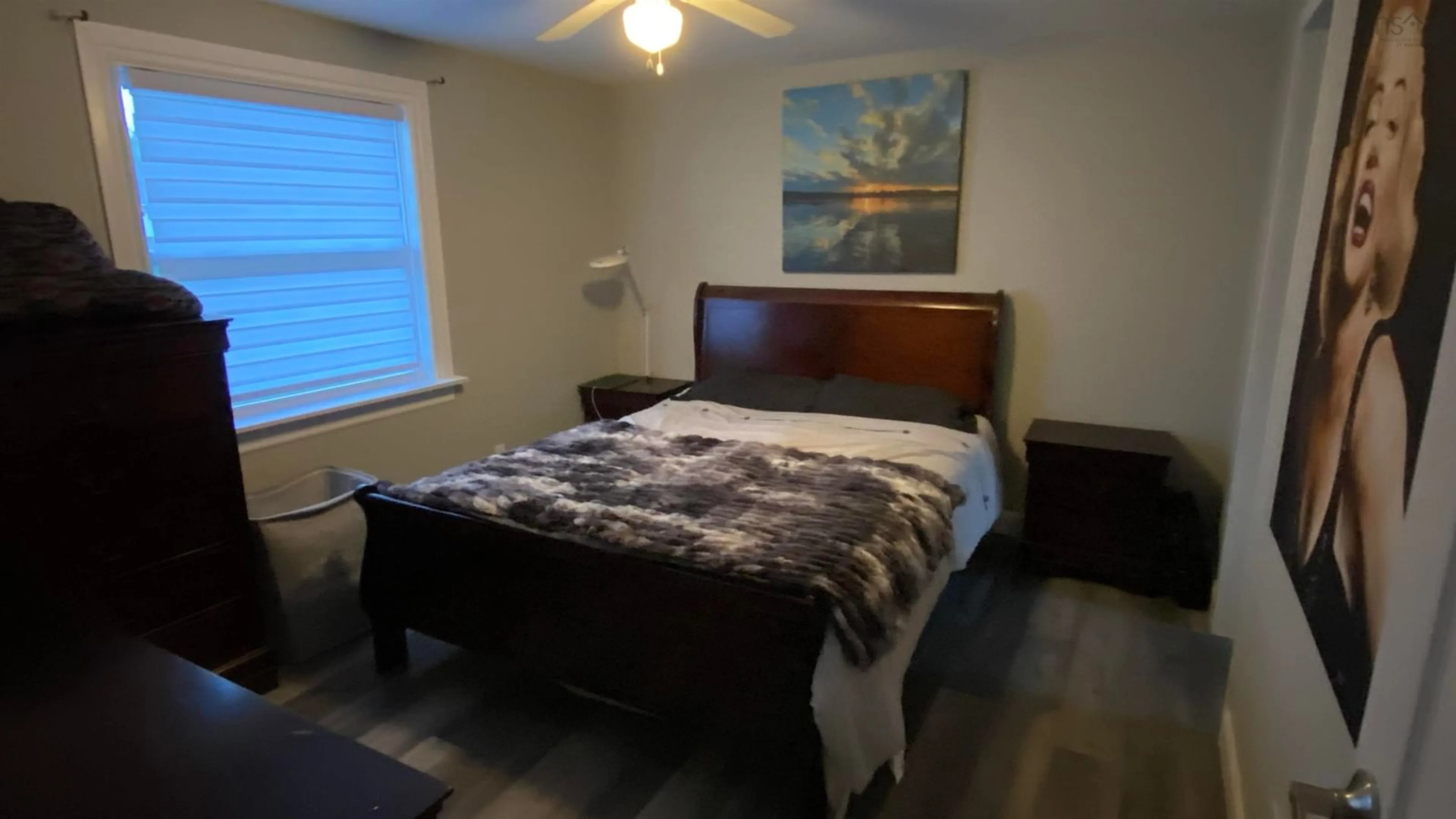 Bedroom with bed, wood/laminate floor for 3030 Macleod Ave, River Ryan Nova Scotia B1H 1J7