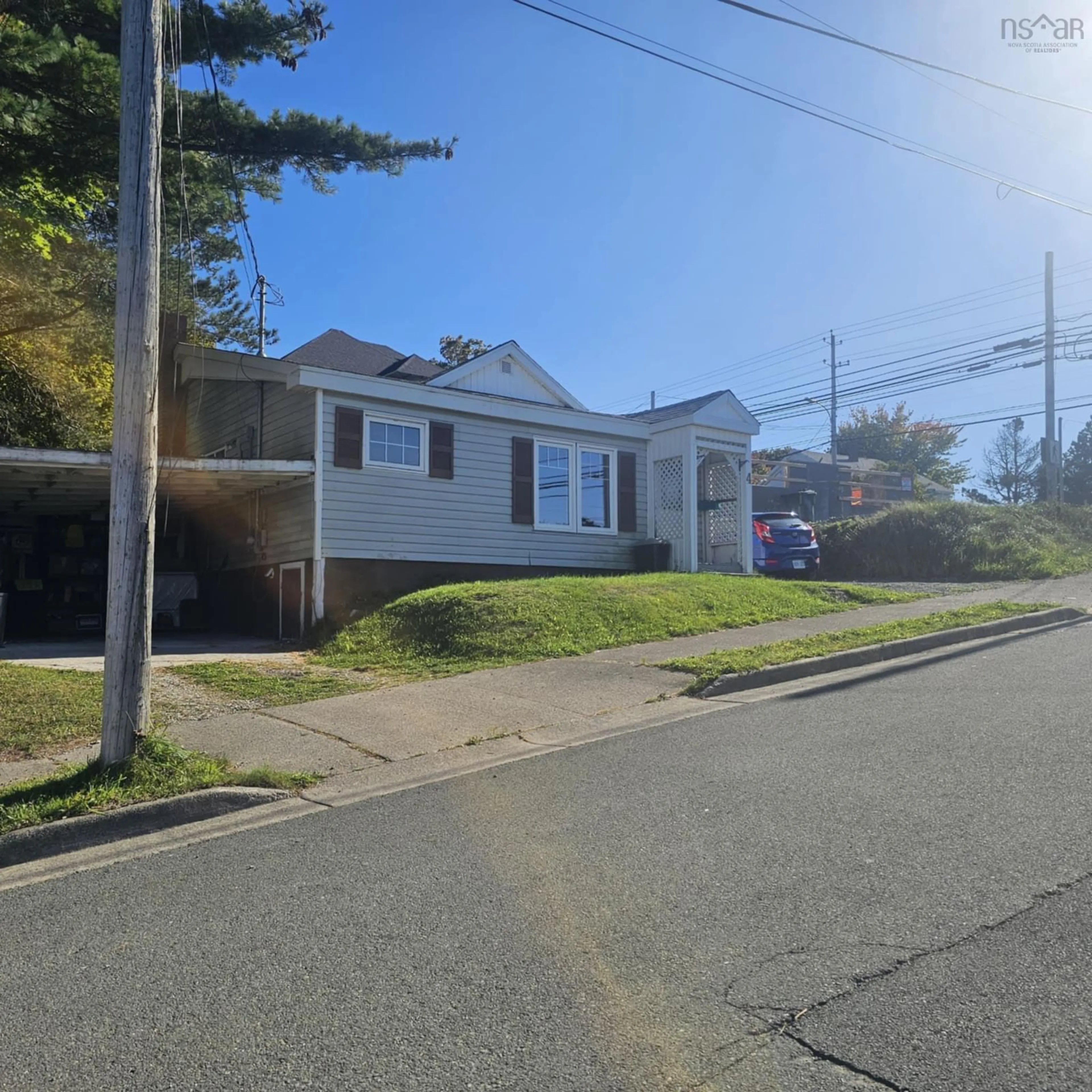 A pic from outside/outdoor area/front of a property/back of a property/a pic from drone, street for 4 Spring St, Sydney Nova Scotia B1P 3P2