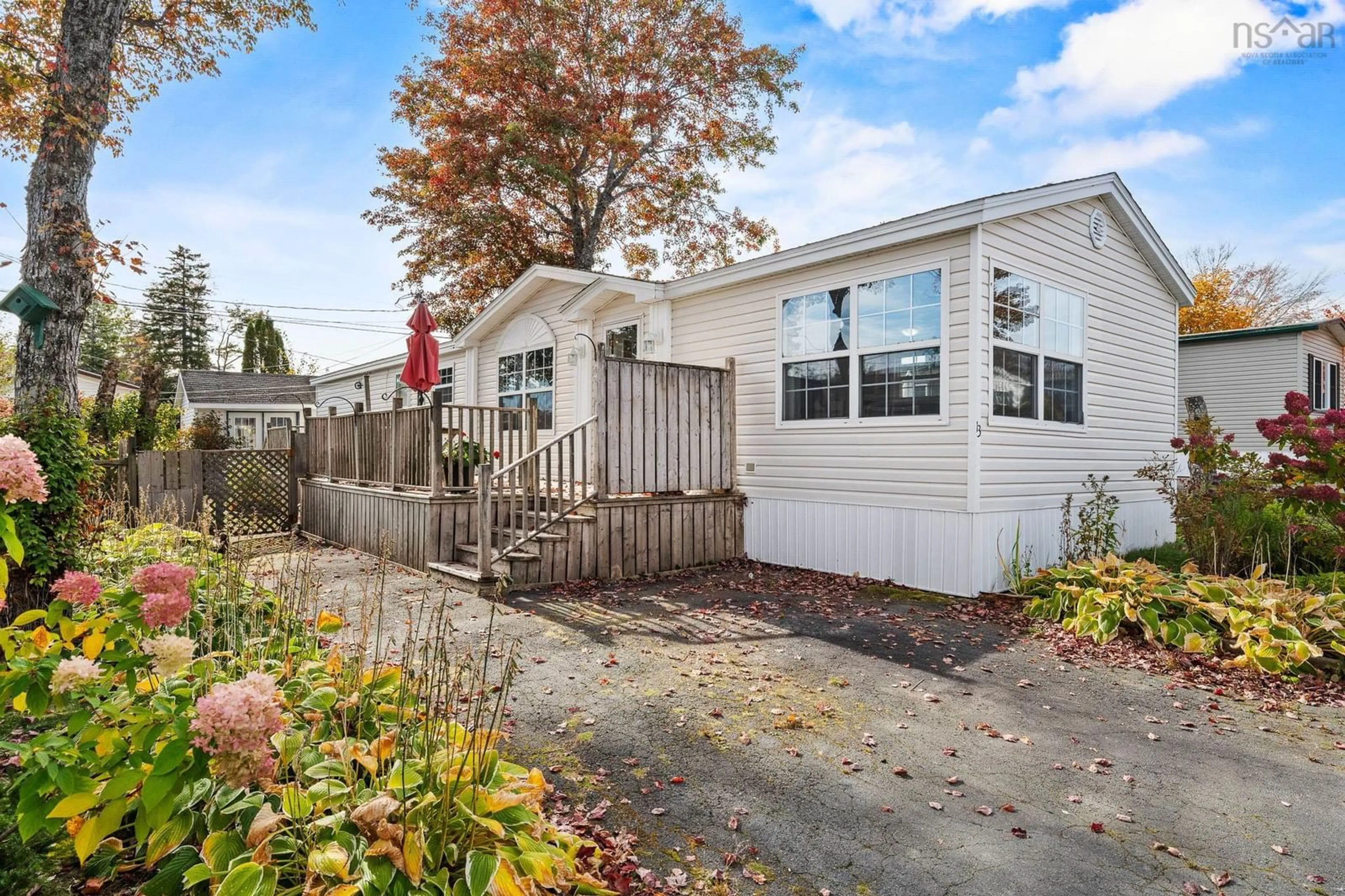 Home with vinyl exterior material, street for 13 Eighth St, Lucasville Nova Scotia B4B 0C9