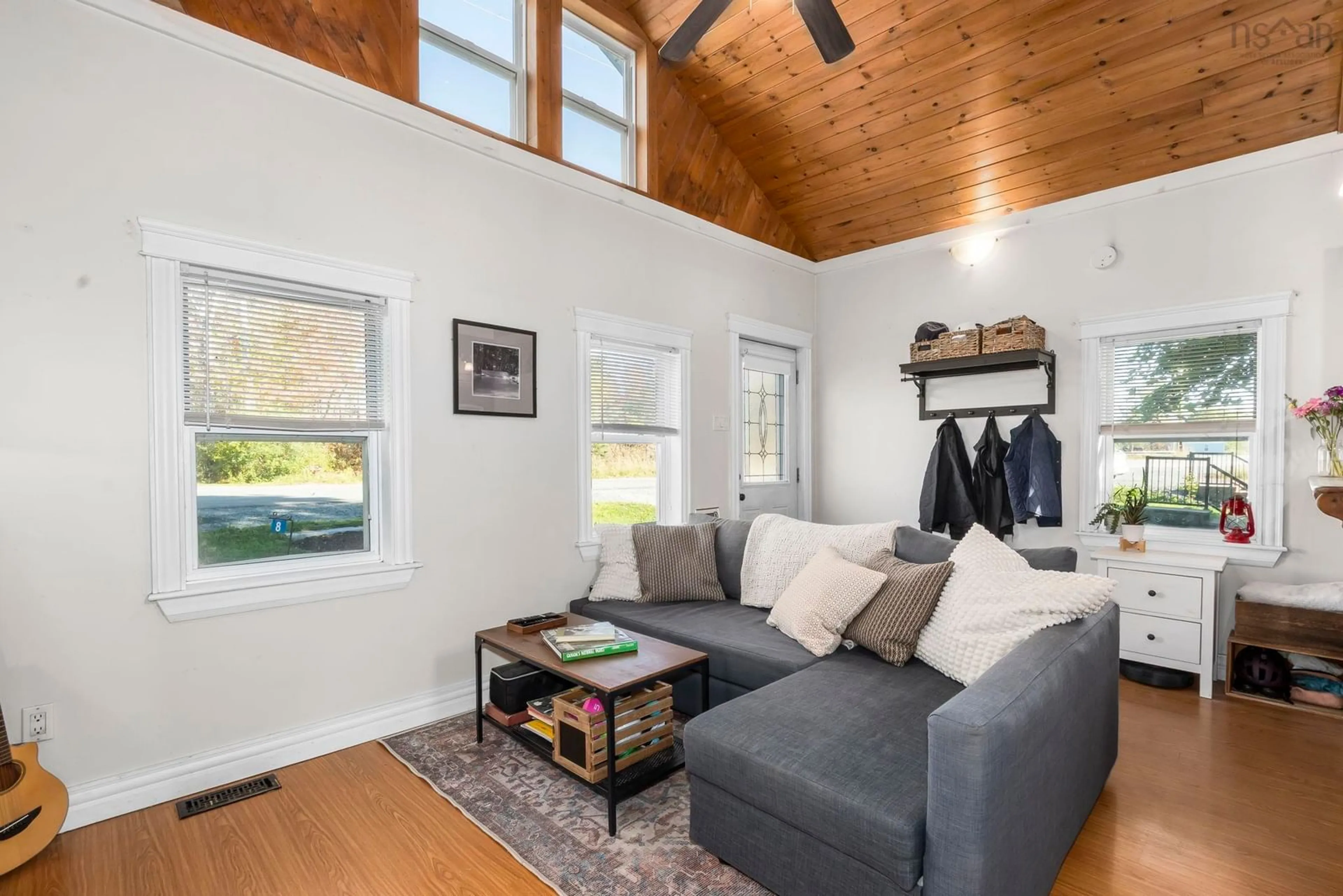 Living room with furniture, wood/laminate floor for 8 Bakery Lane, Enfield Nova Scotia B2T 1A7