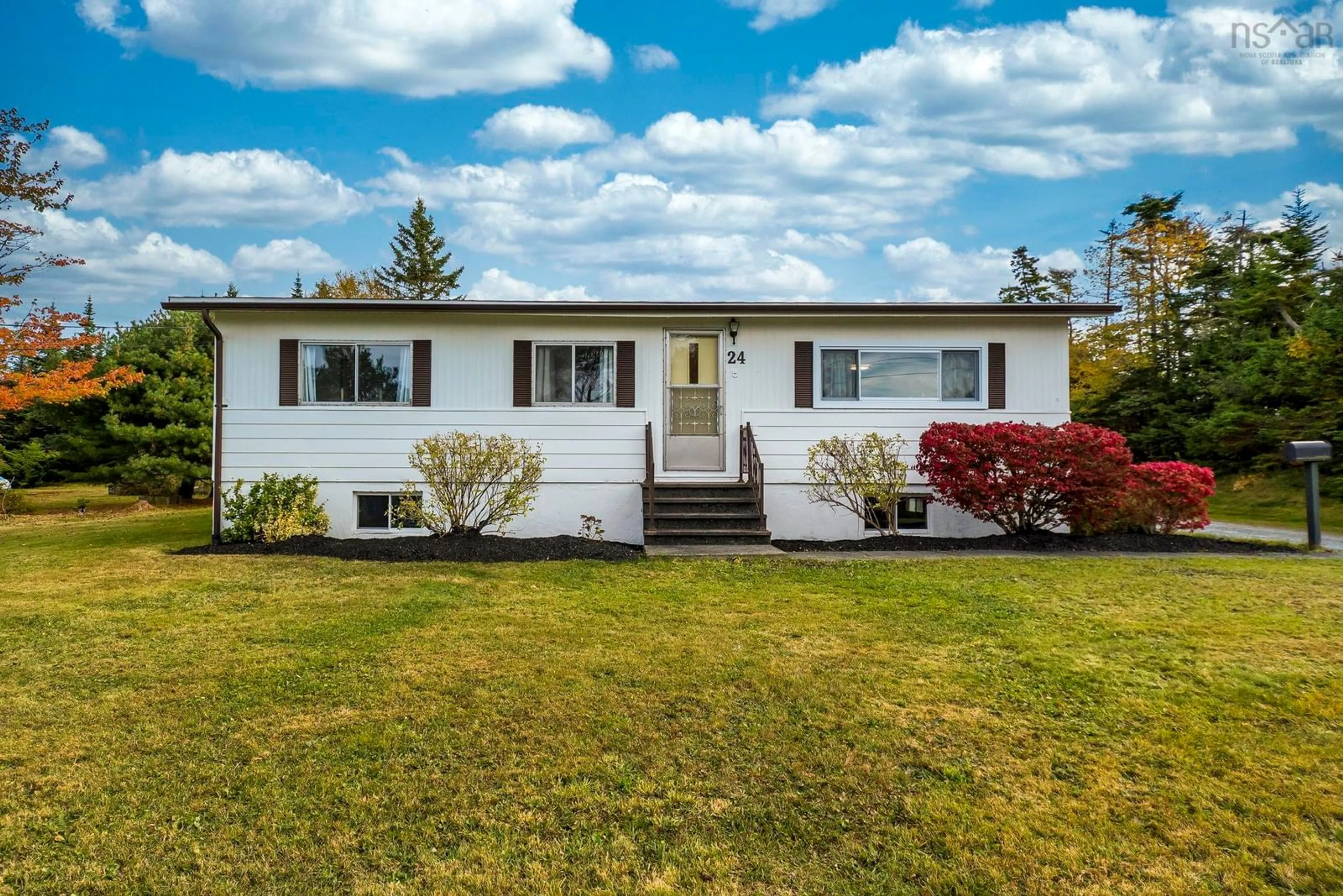 Home with vinyl exterior material, unknown for 24 Moore Dr, Lawrencetown Nova Scotia B2Z 1R2