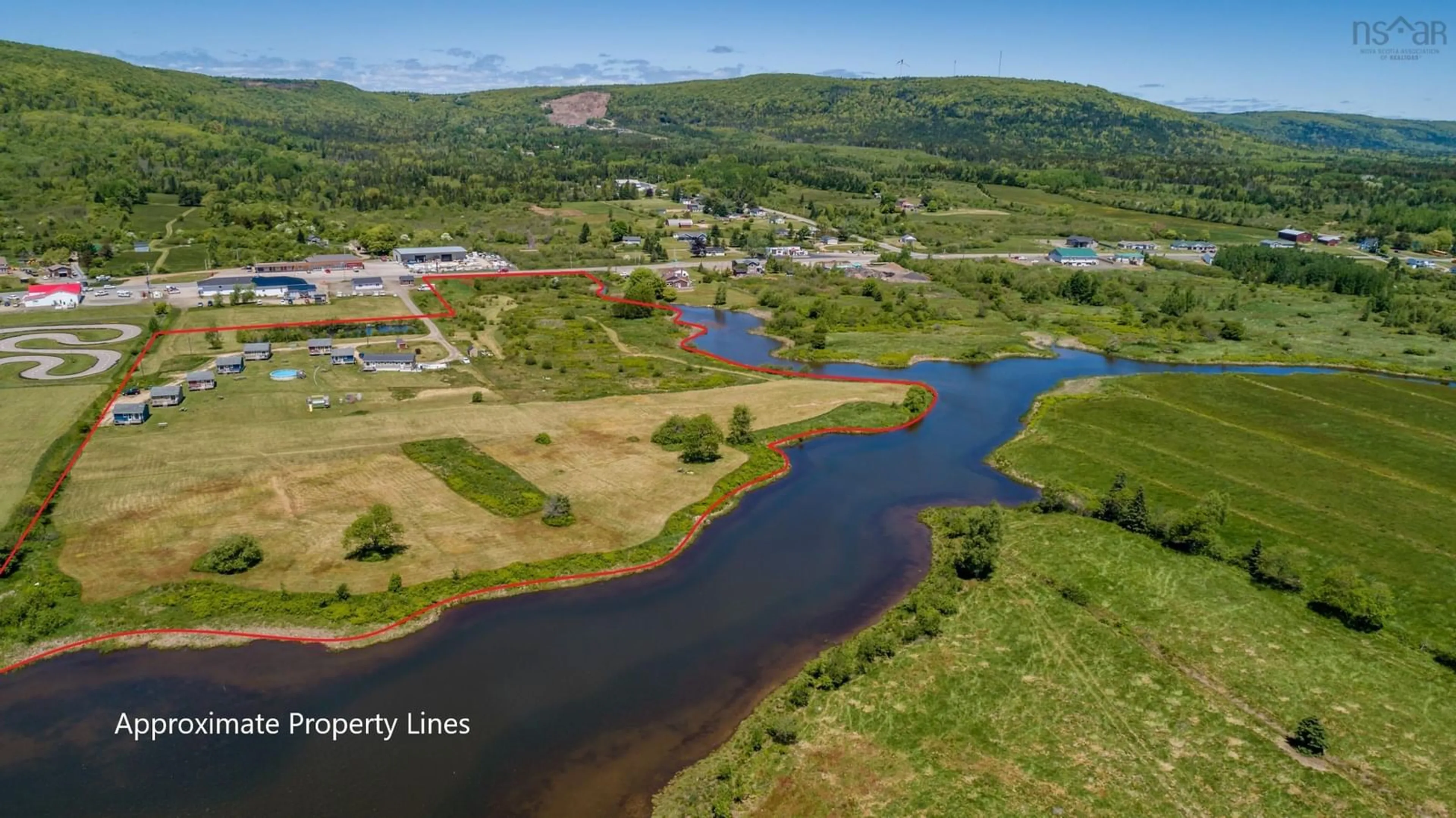 A pic from outside/outdoor area/front of a property/back of a property/a pic from drone, water/lake/river/ocean view for 4752 Highway 1, Granville Ferry Nova Scotia B0S 1A0