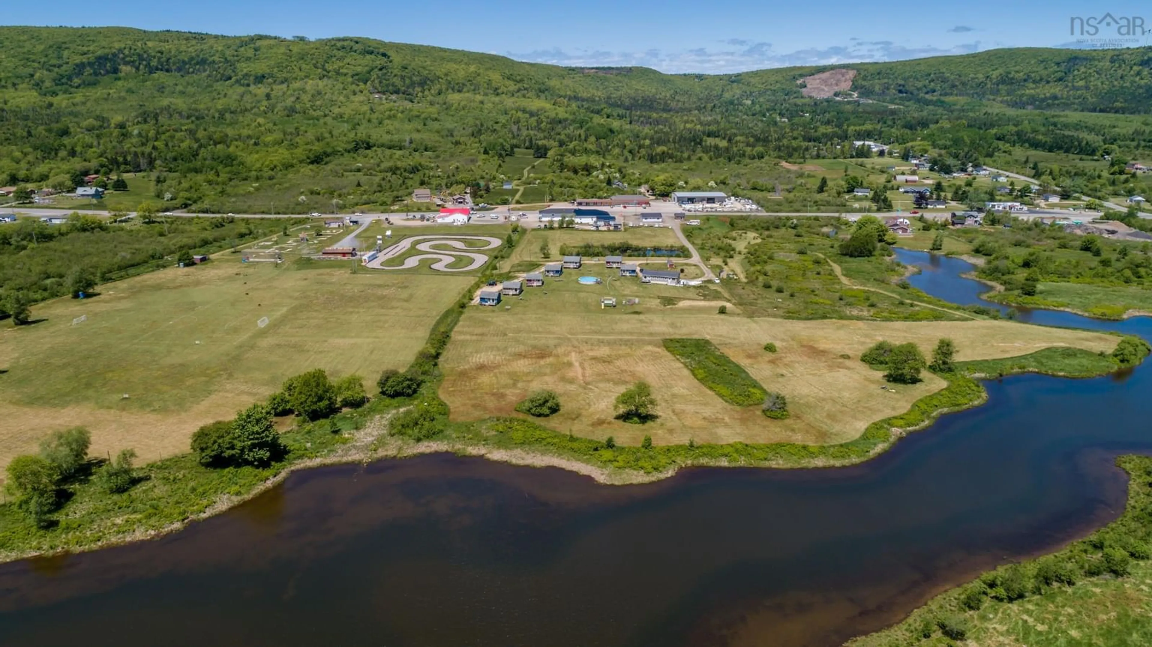 A pic from outside/outdoor area/front of a property/back of a property/a pic from drone, water/lake/river/ocean view for 4752 Highway 1, Granville Ferry Nova Scotia B0S 1A0