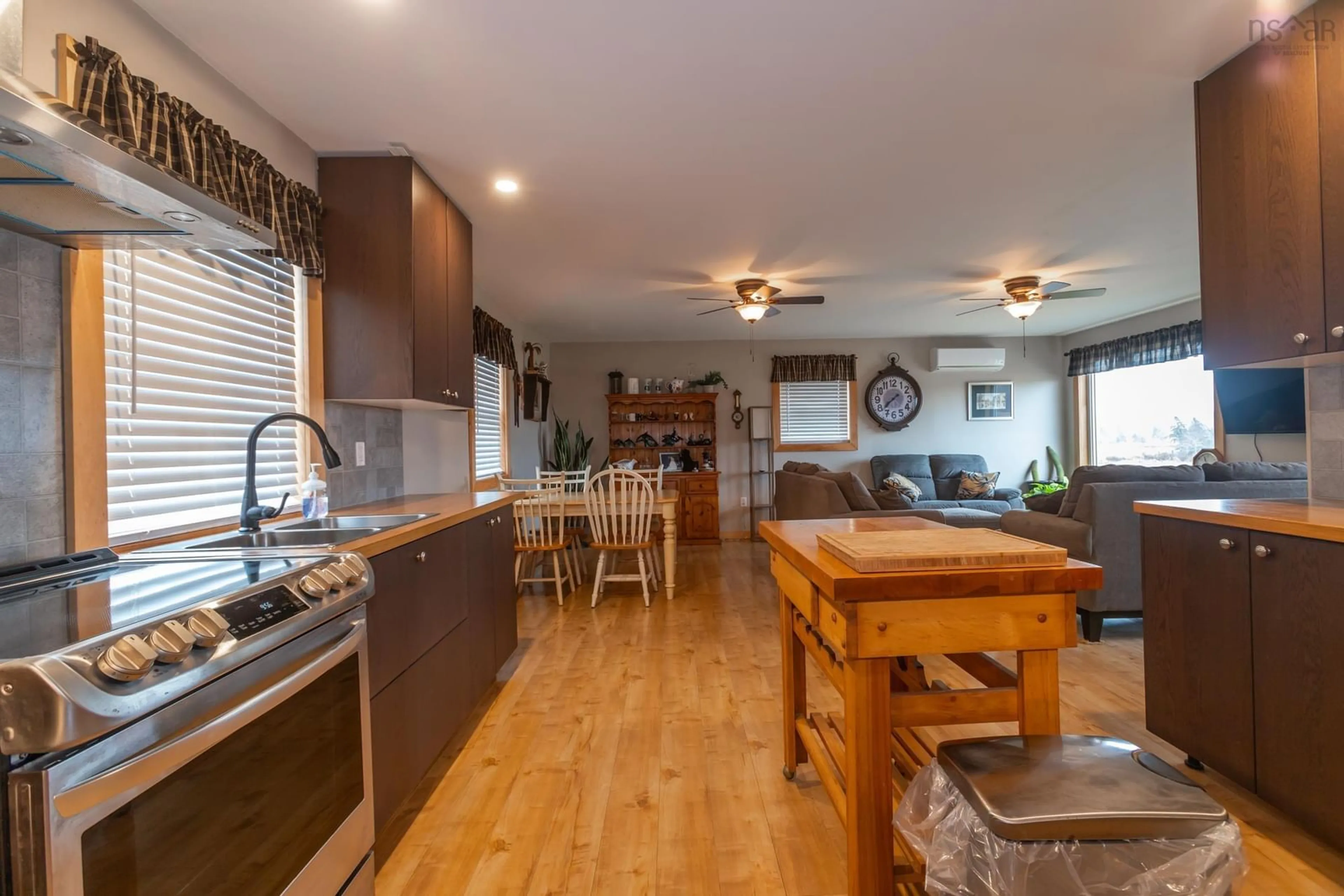 Open concept kitchen, wood/laminate floor for 4752 Highway 1, Granville Ferry Nova Scotia B0S 1A0