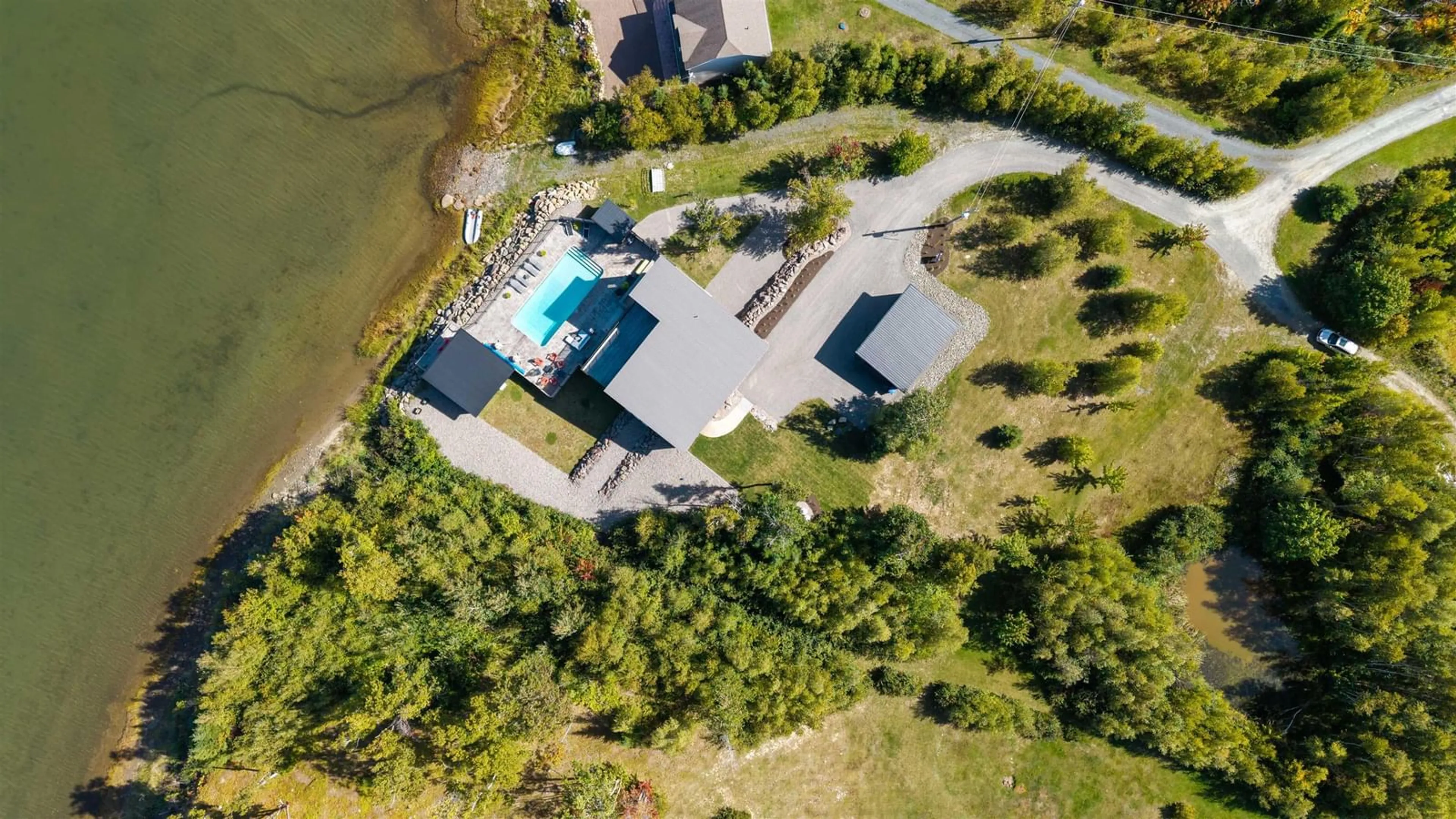 A pic from outside/outdoor area/front of a property/back of a property/a pic from drone, water/lake/river/ocean view for 41 Rose Heath Lane, Little Harbour Nova Scotia B2H 5C4