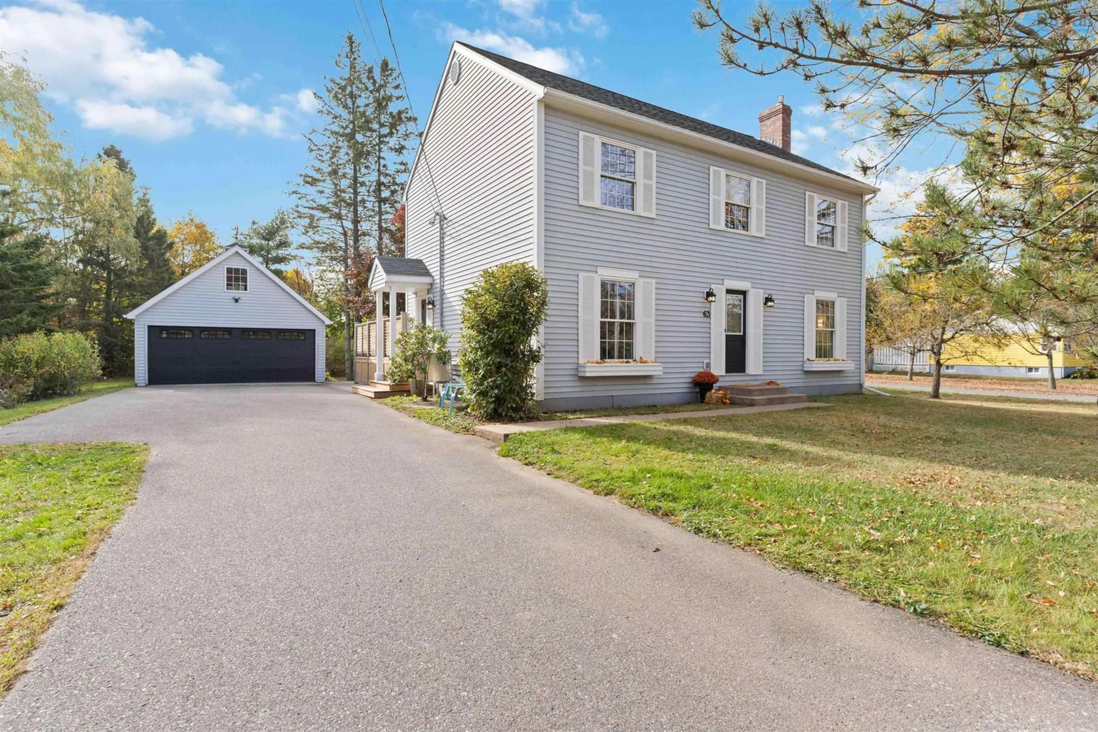 A pic from outside/outdoor area/front of a property/back of a property/a pic from drone, street for 63 Main St, Wolfville Nova Scotia B4P 1B8