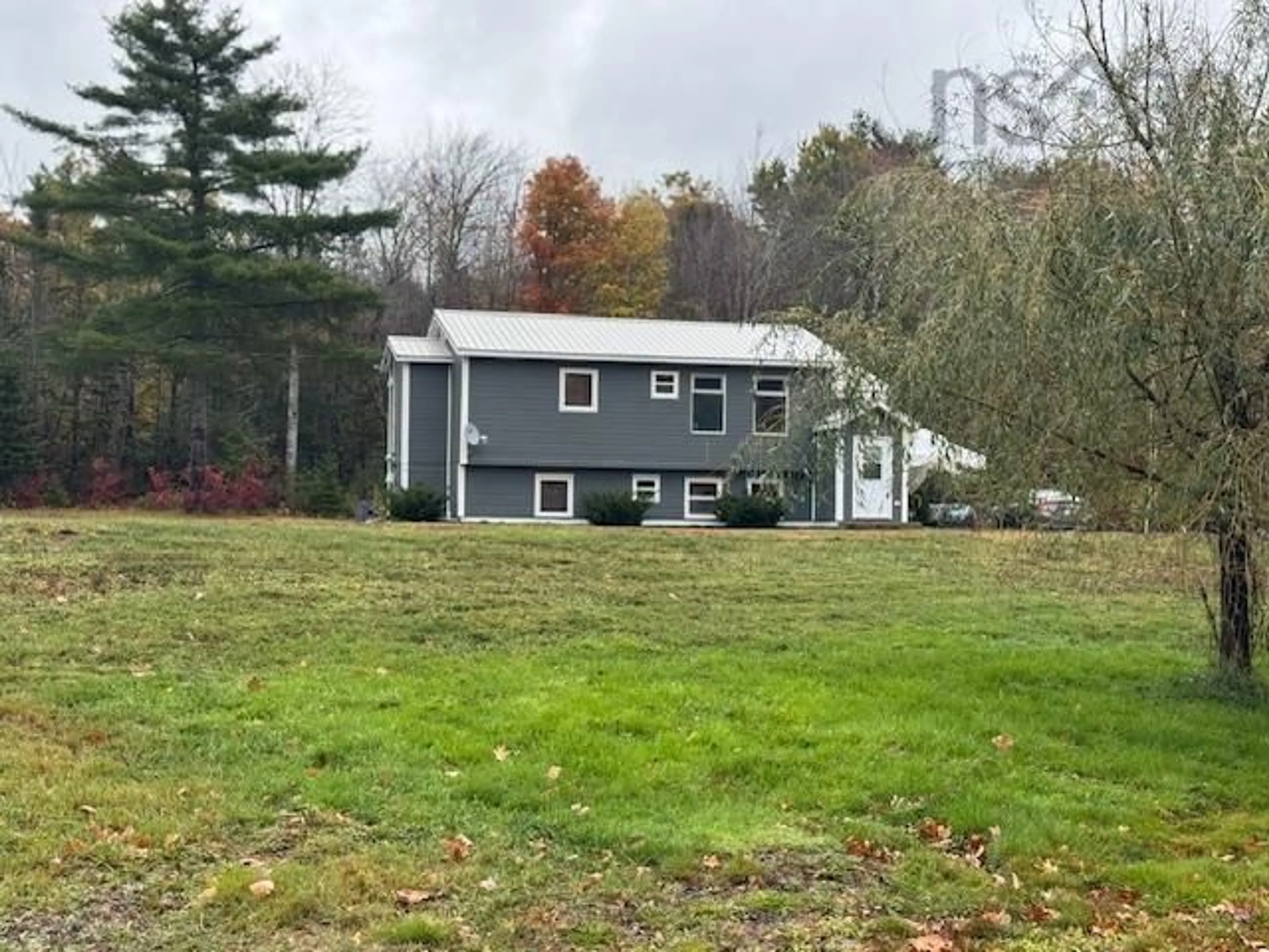 A pic from outside/outdoor area/front of a property/back of a property/a pic from drone, unknown for 3806 Highway 10, Pinehurst Nova Scotia B0R 1E0