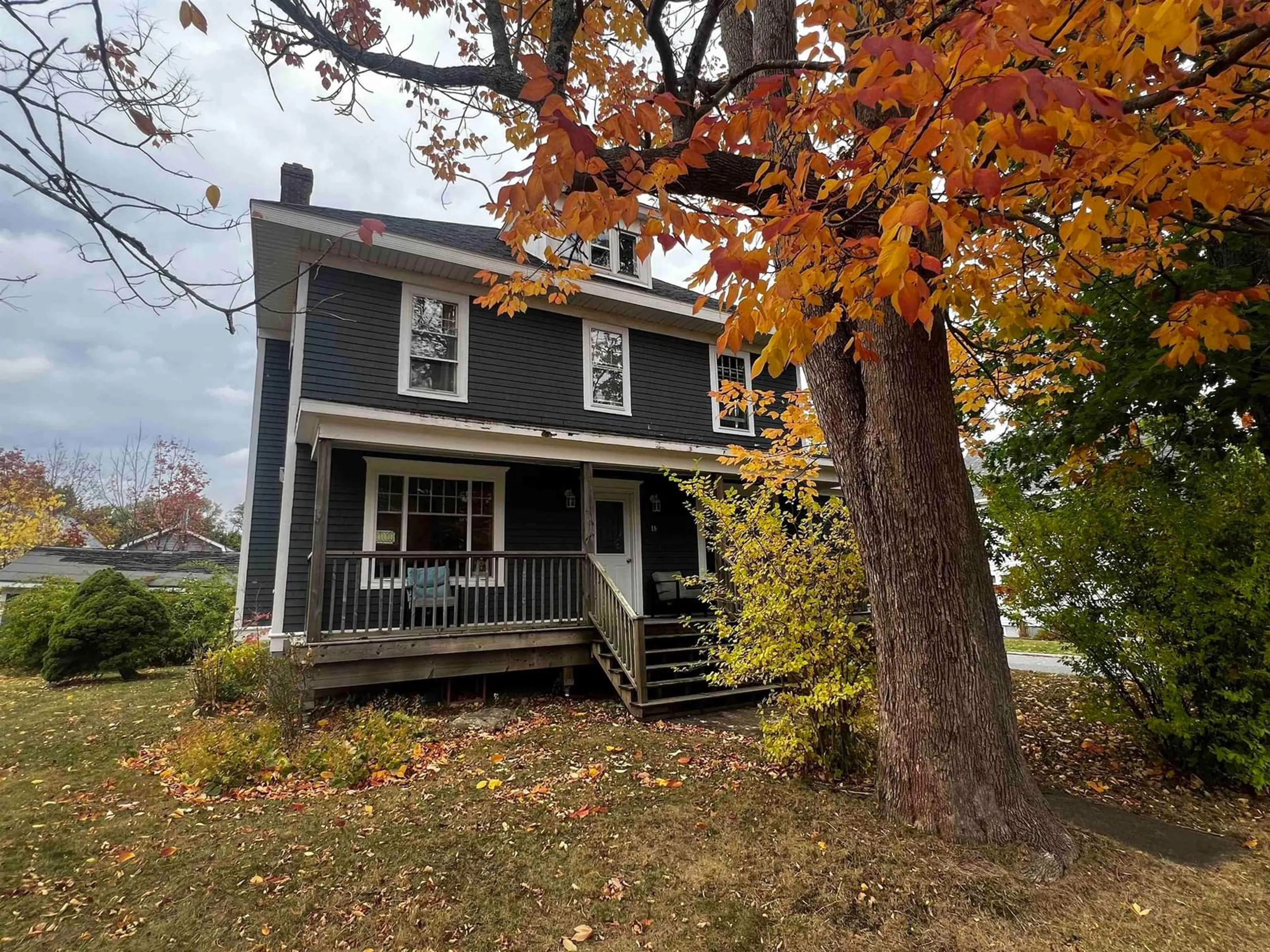Home with vinyl exterior material, street for 18 Claremont Ave, Stellarton Nova Scotia B0K 1S0