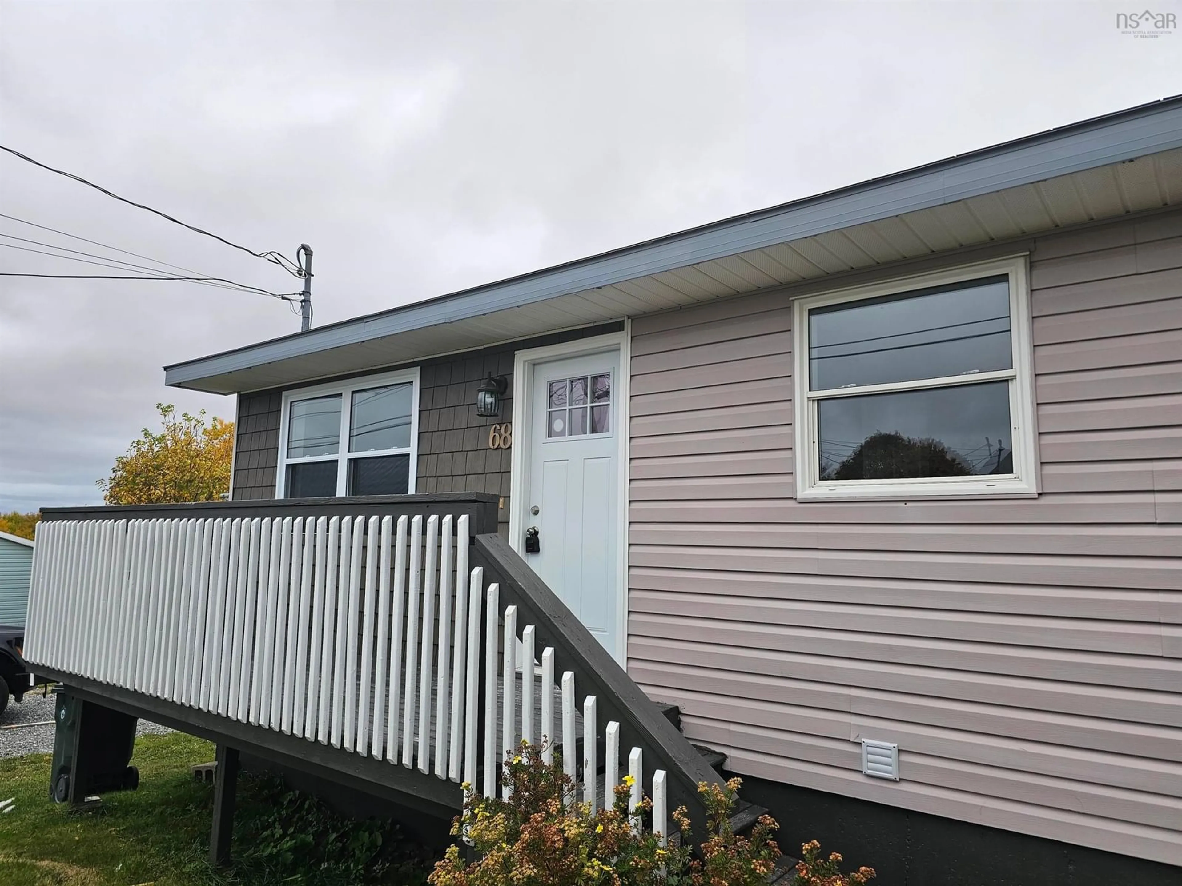 Home with vinyl exterior material, street for 68 Macdonald Cres, Sydney Mines Nova Scotia B1Y 3H5