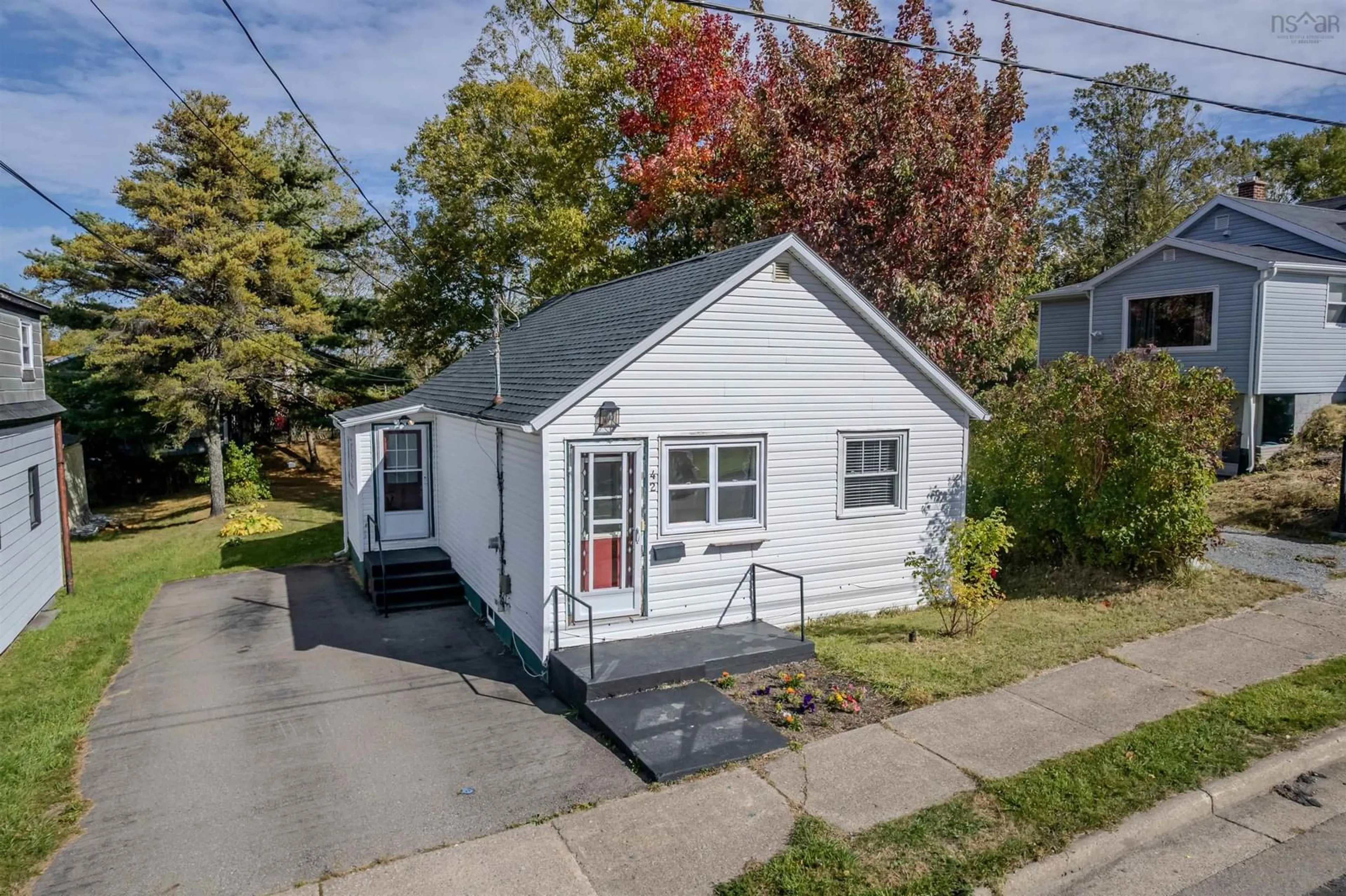 Home with vinyl exterior material, street for 42 Thomas St, Sydney Nova Scotia B1S 2R3