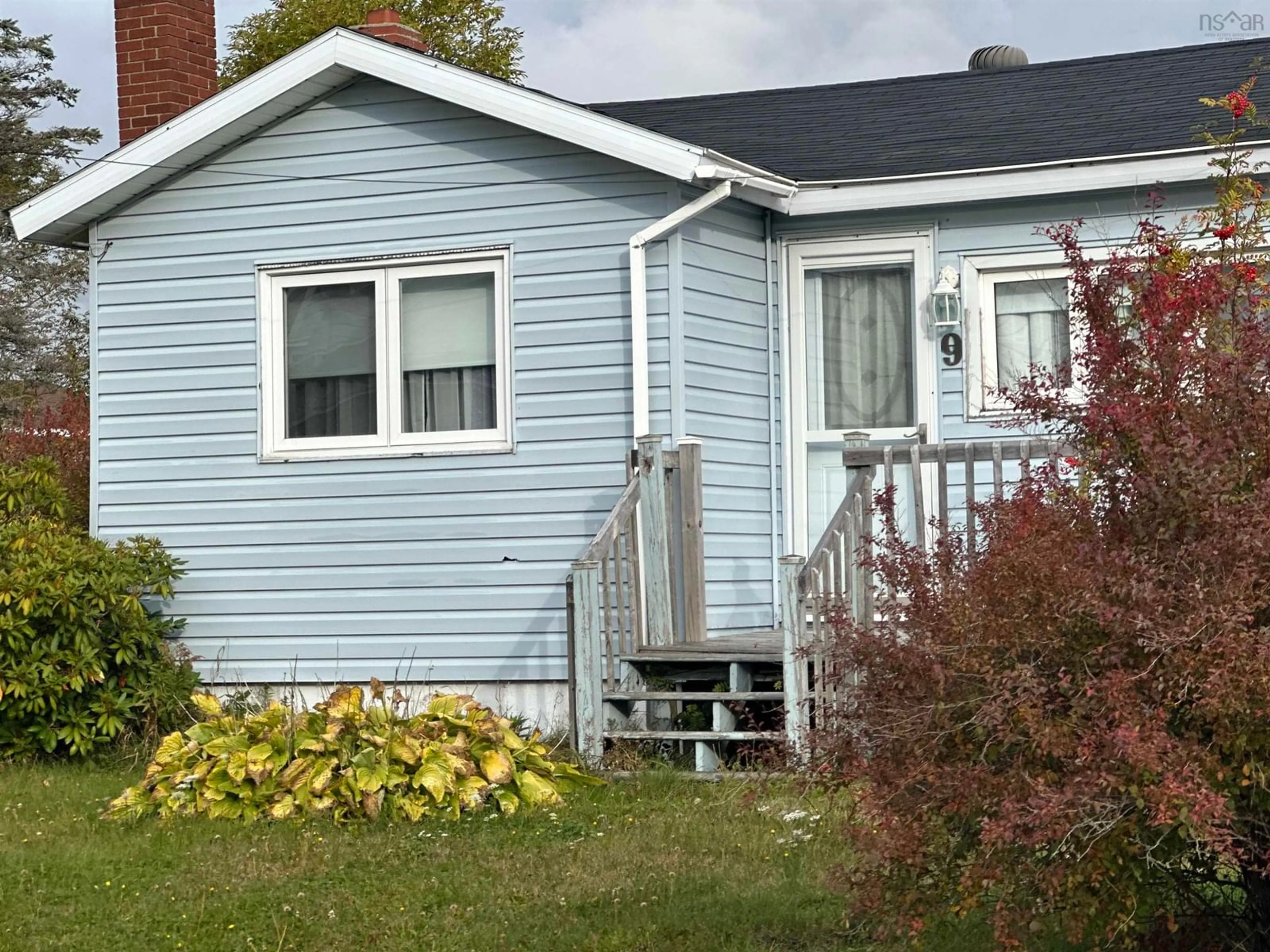 Home with vinyl exterior material, street for 9 Kennelly Ave, Reserve Nova Scotia B1E 1C6