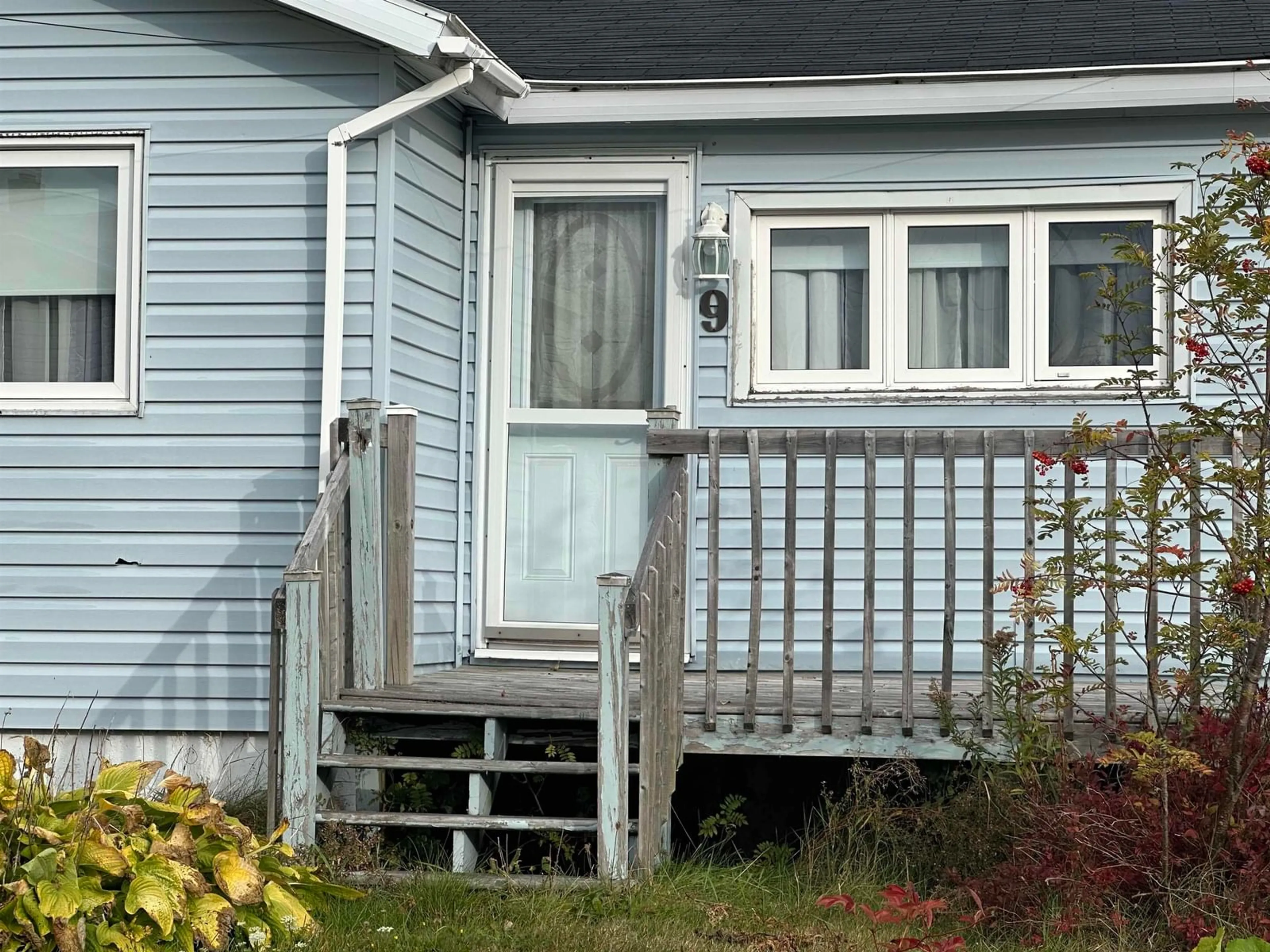 Home with vinyl exterior material, street for 9 Kennelly Ave, Reserve Nova Scotia B1E 1C6