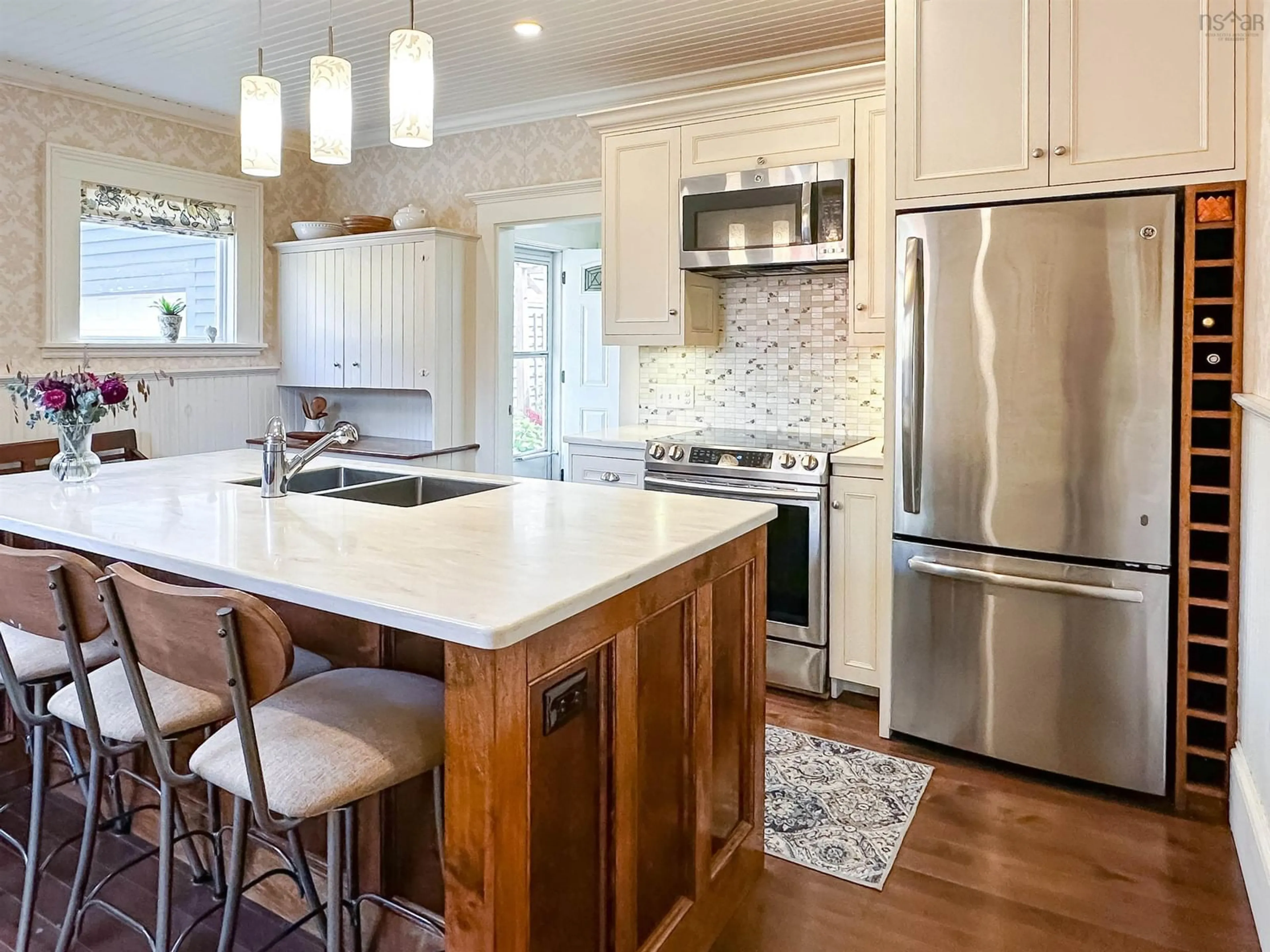 Open concept kitchen, wood/laminate floor for 9682 Highway 221, Canning Nova Scotia B0P 1H0