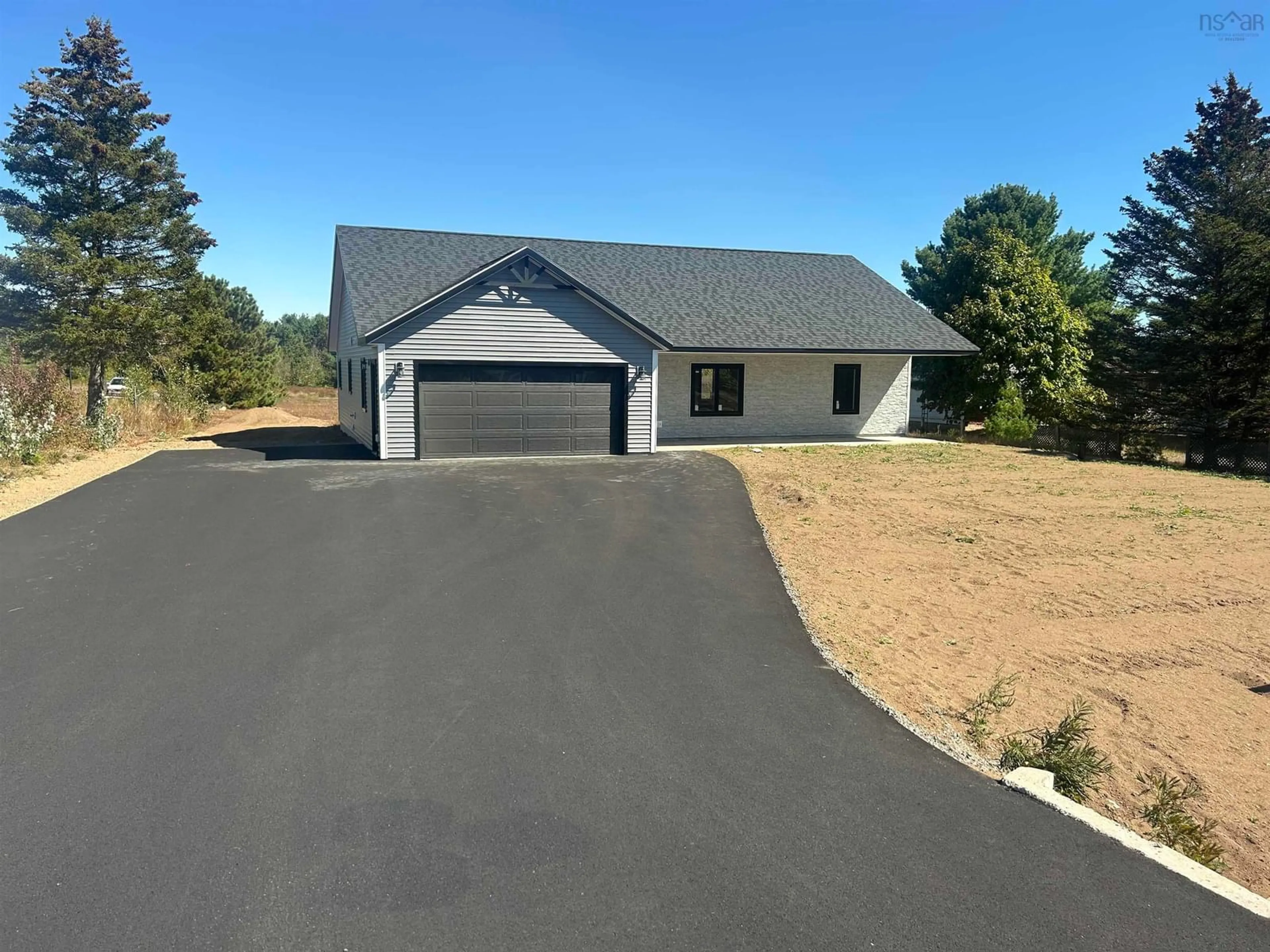 Home with vinyl exterior material, street for 1866 Greenwood Dr, Kingston Nova Scotia B0P 1R0