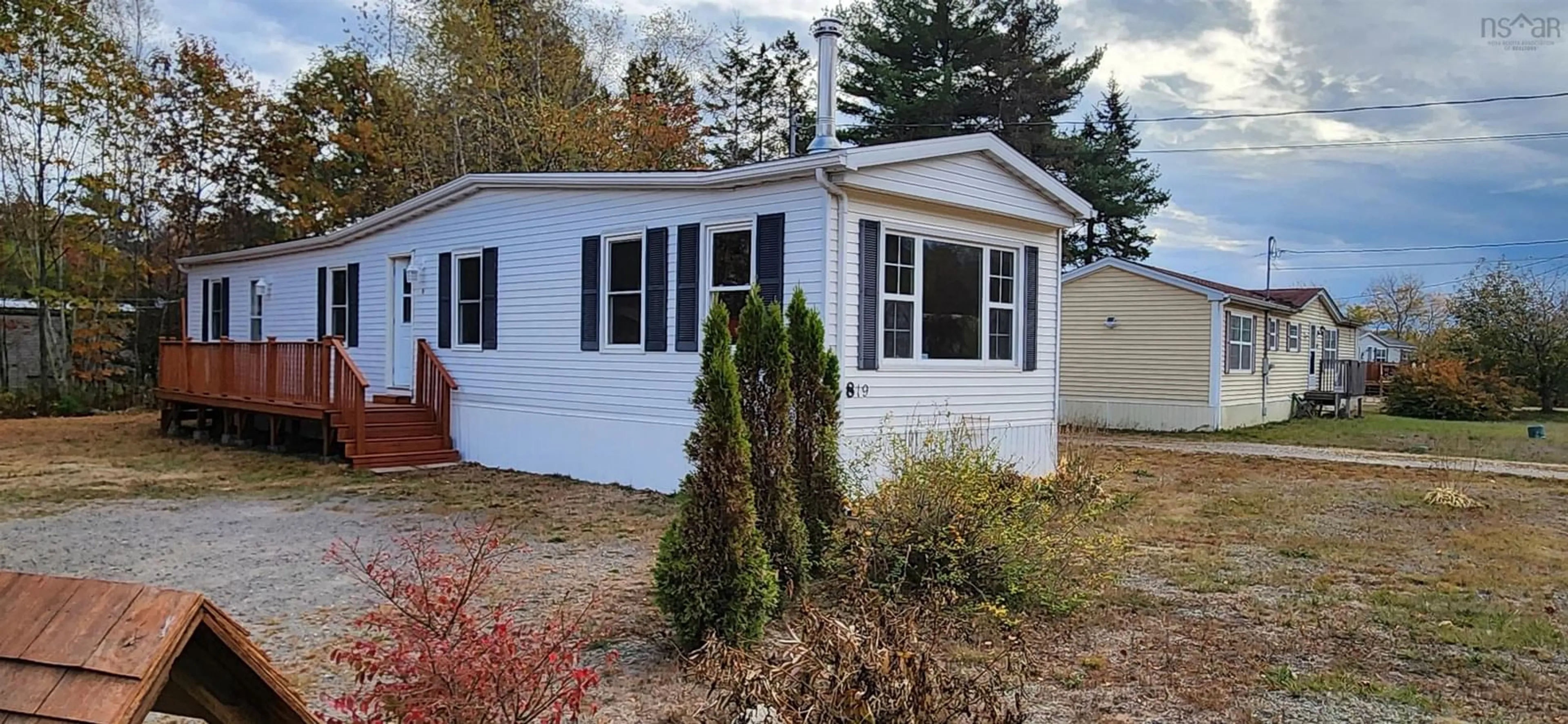 Home with vinyl exterior material, street for 819 Mitchell Ave, Aylesford Nova Scotia B0P 1C0