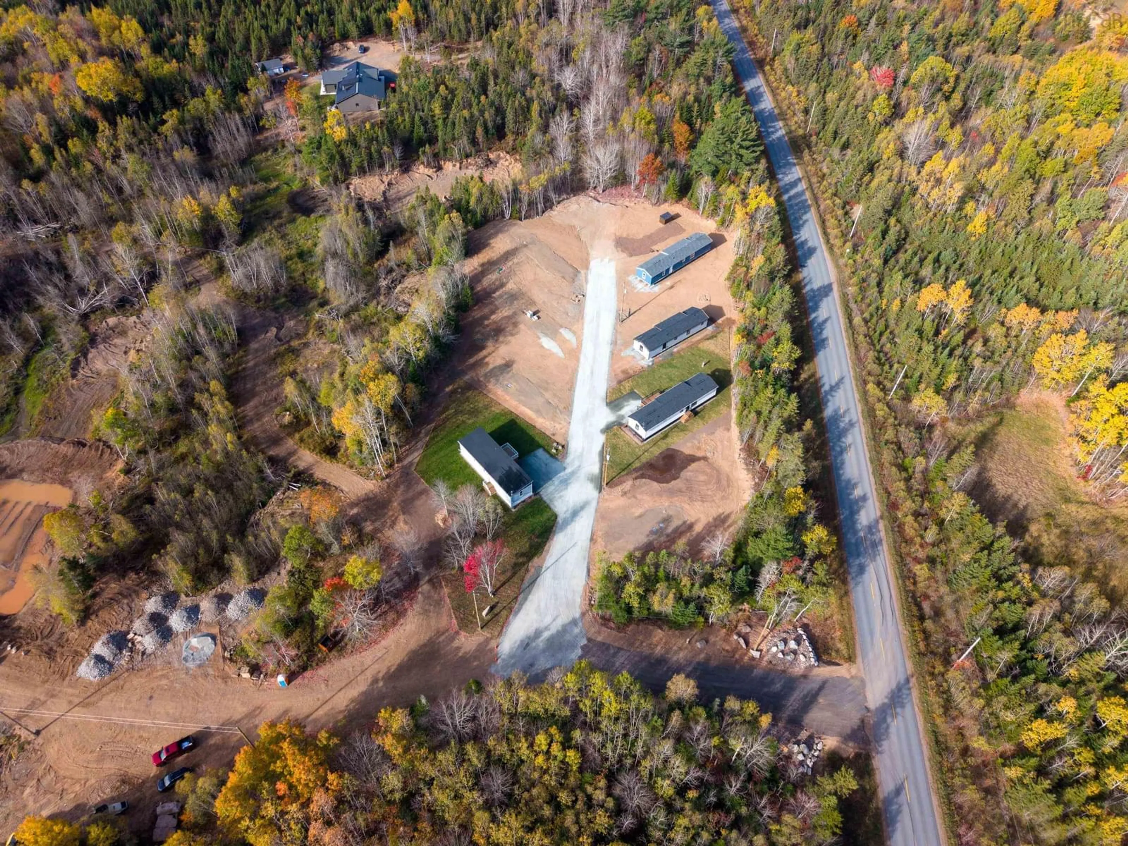 A pic from outside/outdoor area/front of a property/back of a property/a pic from drone, forest/trees view for 5 Pebble Lane, West St. Andrews Nova Scotia B0N 2J0