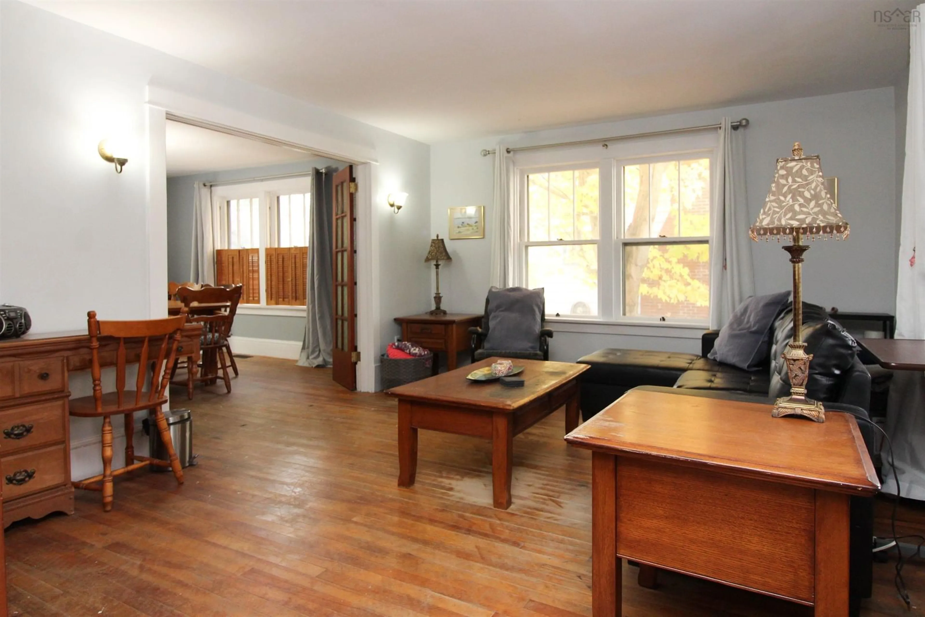 Living room with furniture, wood/laminate floor for 8 Belgrave Terr, Truro Nova Scotia B2N 2G4
