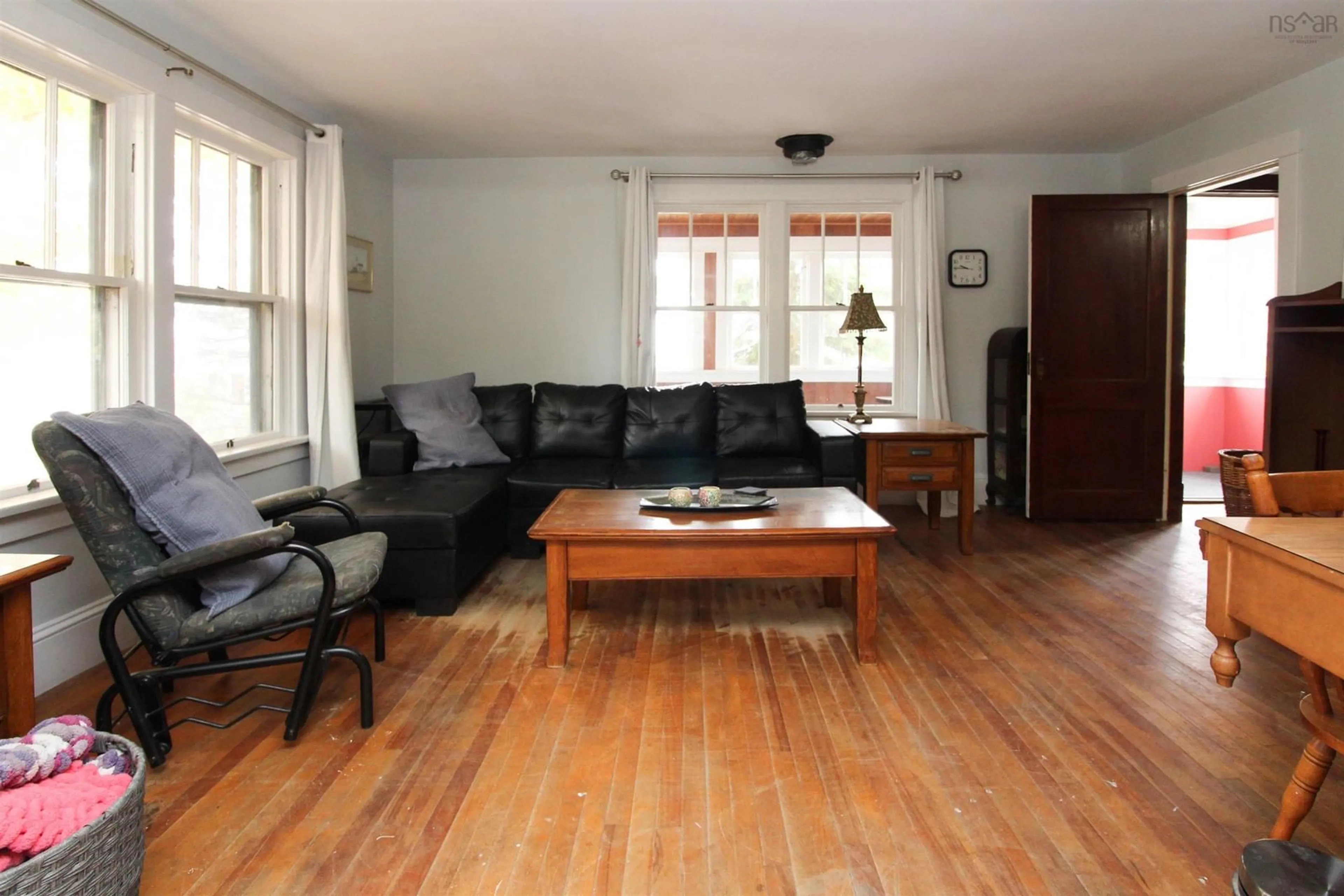 Living room with furniture, wood/laminate floor for 8 Belgrave Terr, Truro Nova Scotia B2N 2G4