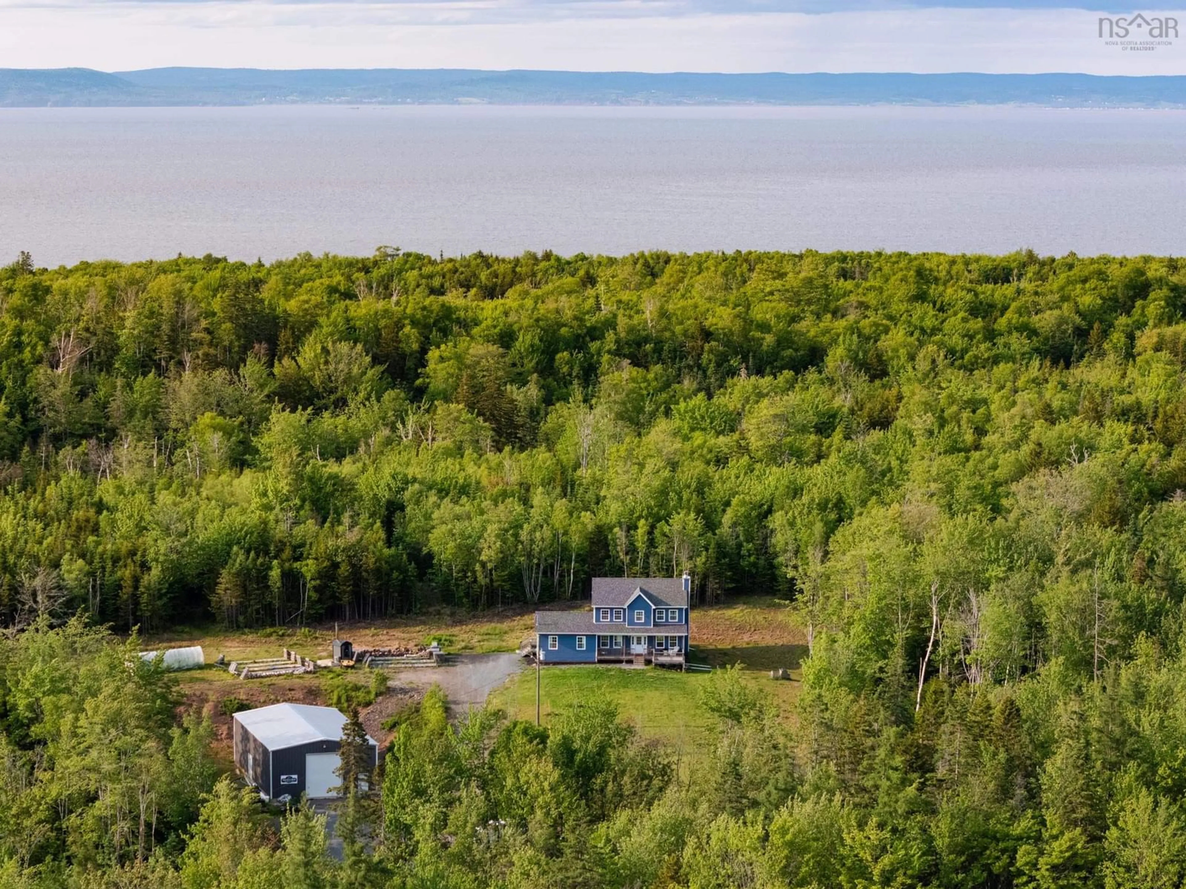 A pic from outside/outdoor area/front of a property/back of a property/a pic from drone, water/lake/river/ocean view for 9409 Highway 215, Pembroke Nova Scotia B0N 2R0
