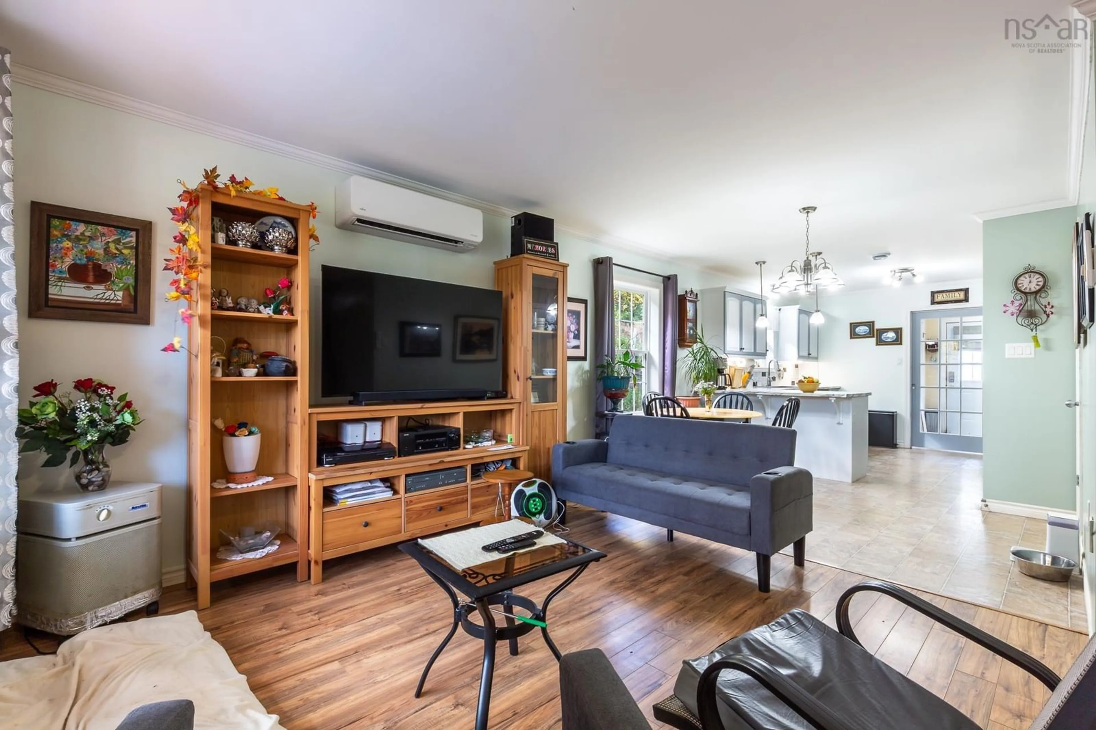 Living room with furniture, wood/laminate floor for 60 Old Deepdale Rd, Inverness Nova Scotia B0E 1N0