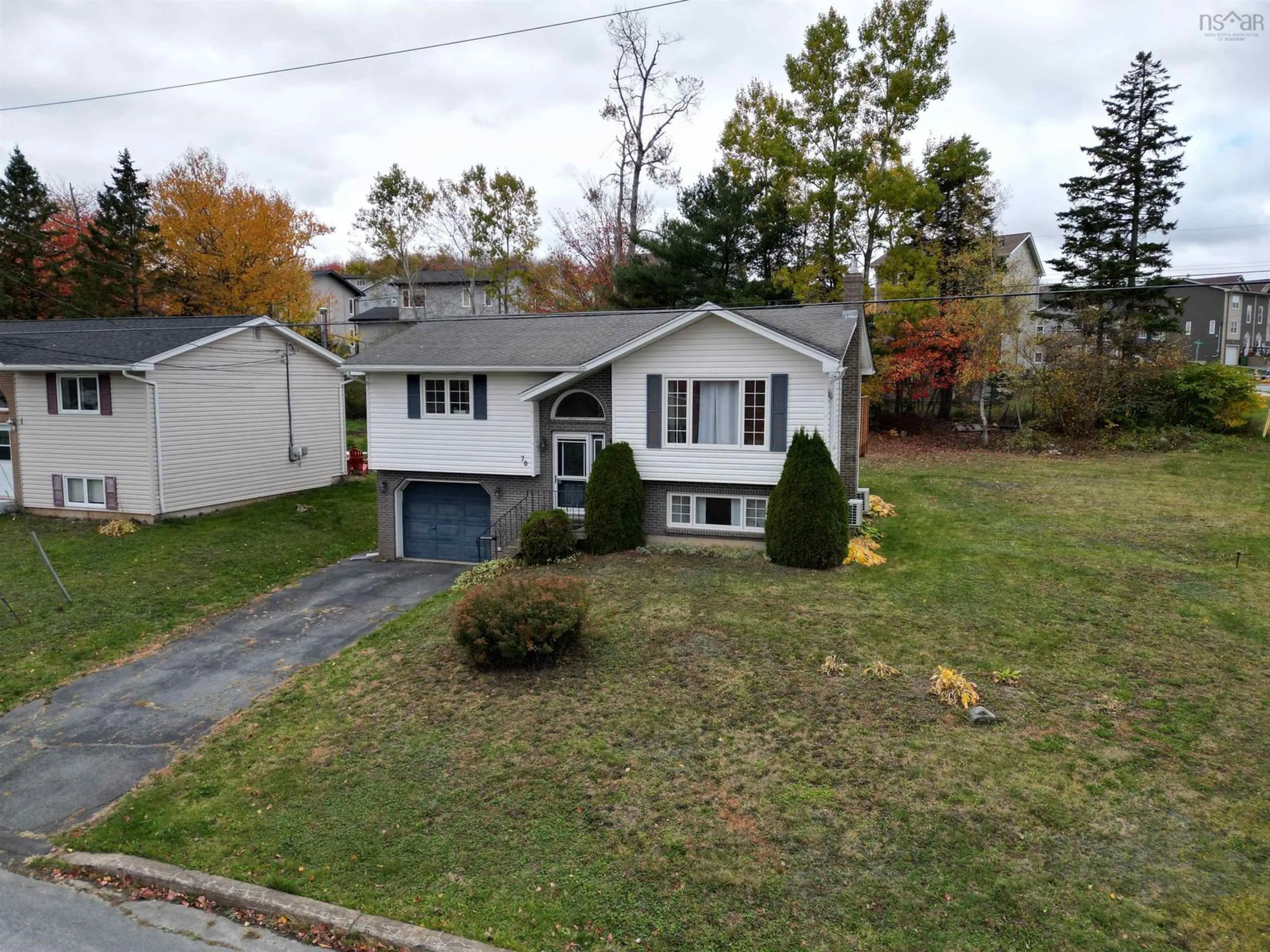 A pic from outside/outdoor area/front of a property/back of a property/a pic from drone, street for 70 Trundle Cres, Middle Sackville Nova Scotia B4E 2X2