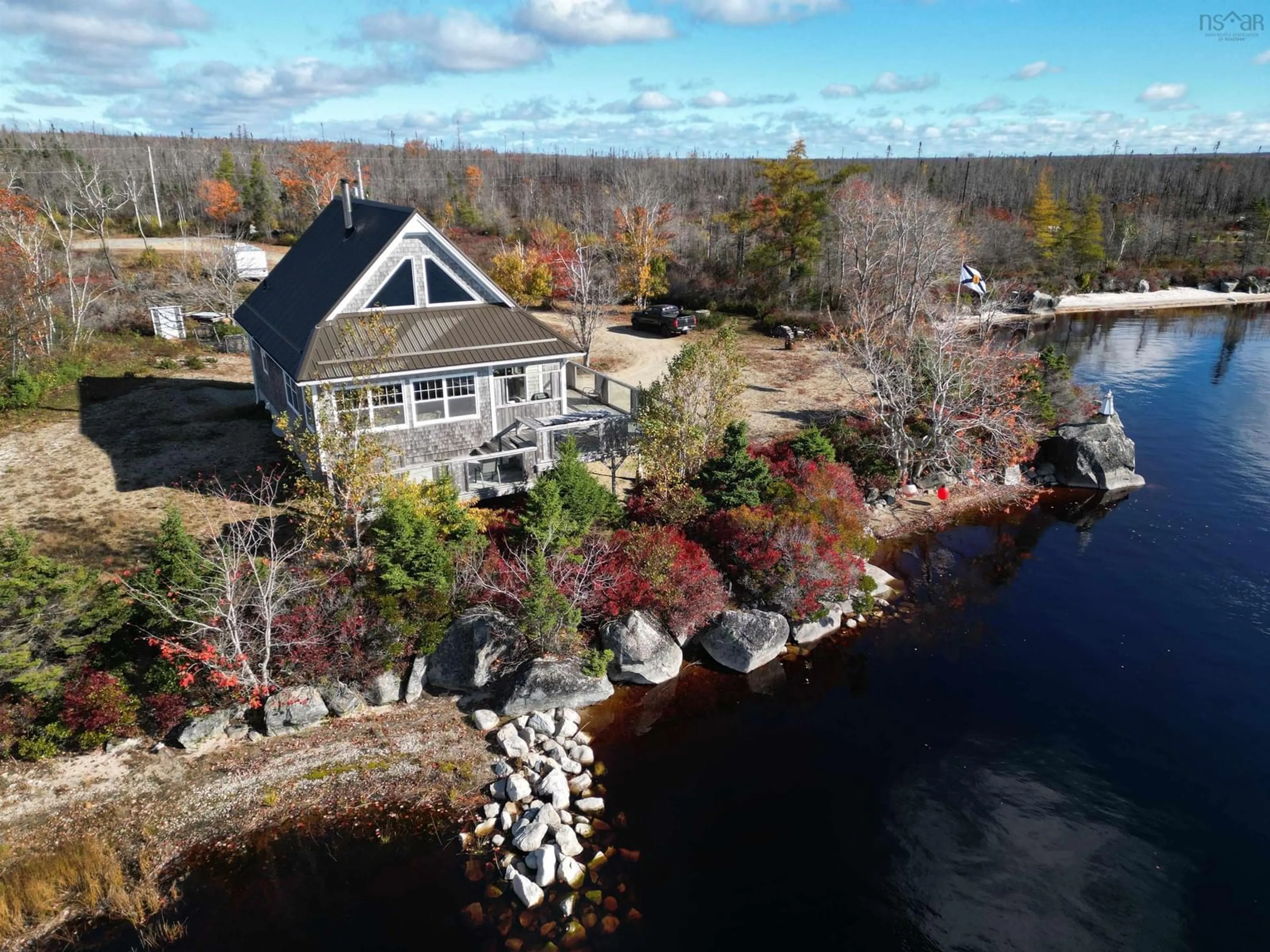 A pic from outside/outdoor area/front of a property/back of a property/a pic from drone, water/lake/river/ocean view for 337 Goose Lake, Goose Lake Nova Scotia B0W 1G0