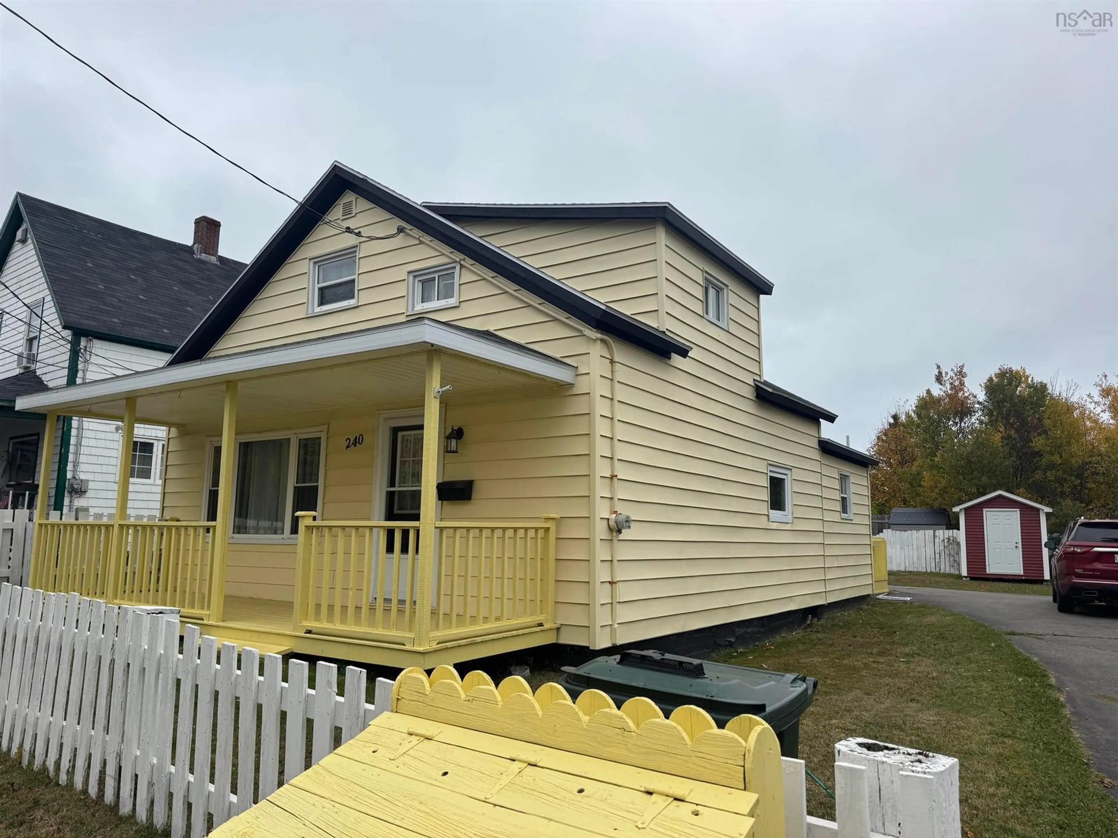 Home with vinyl exterior material, street for 240 Legatto St, Sydney Mines Nova Scotia B1V 2T1