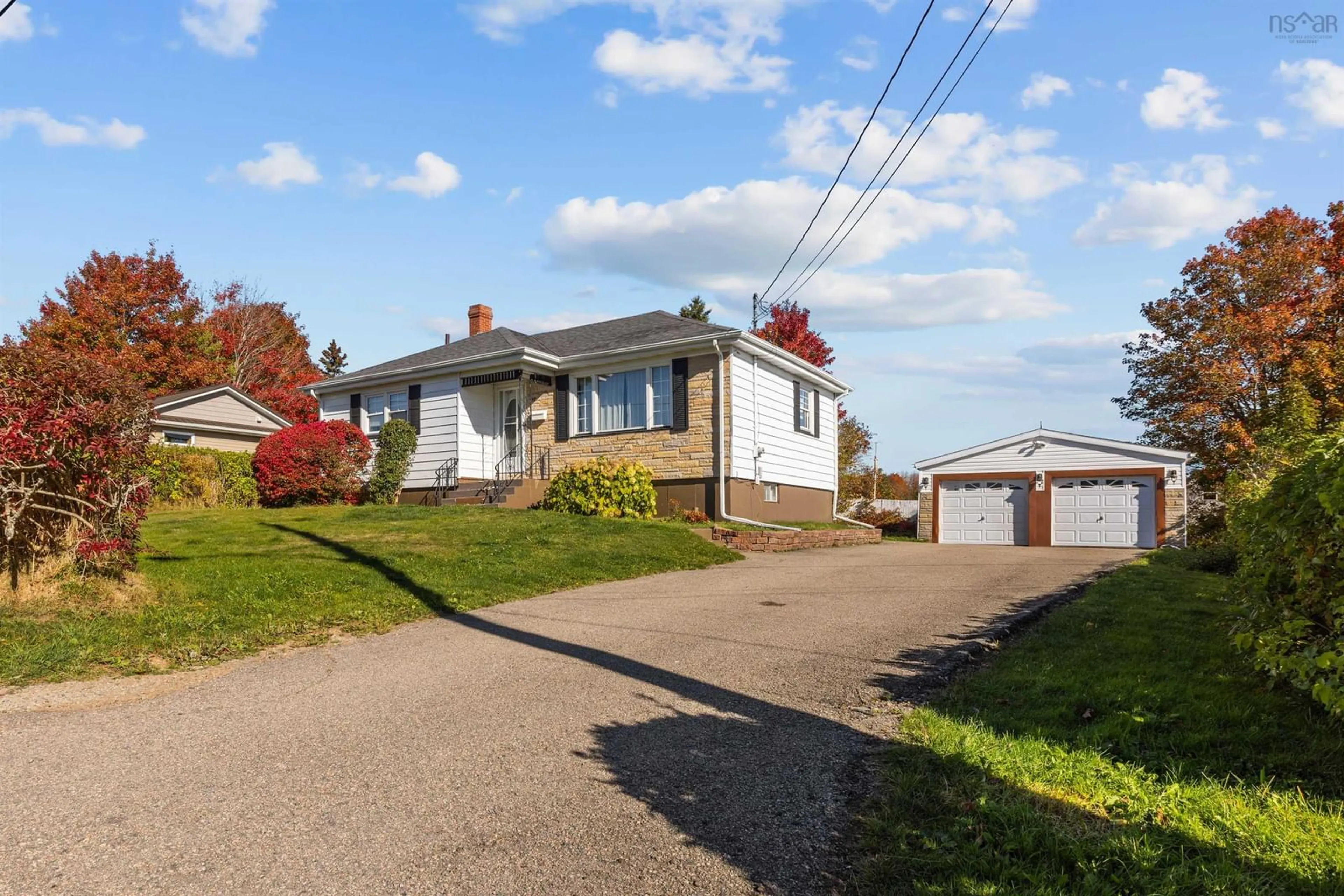 A pic from outside/outdoor area/front of a property/back of a property/a pic from drone, street for 38 Melwood Dr, Westmount Nova Scotia B1R 1W2