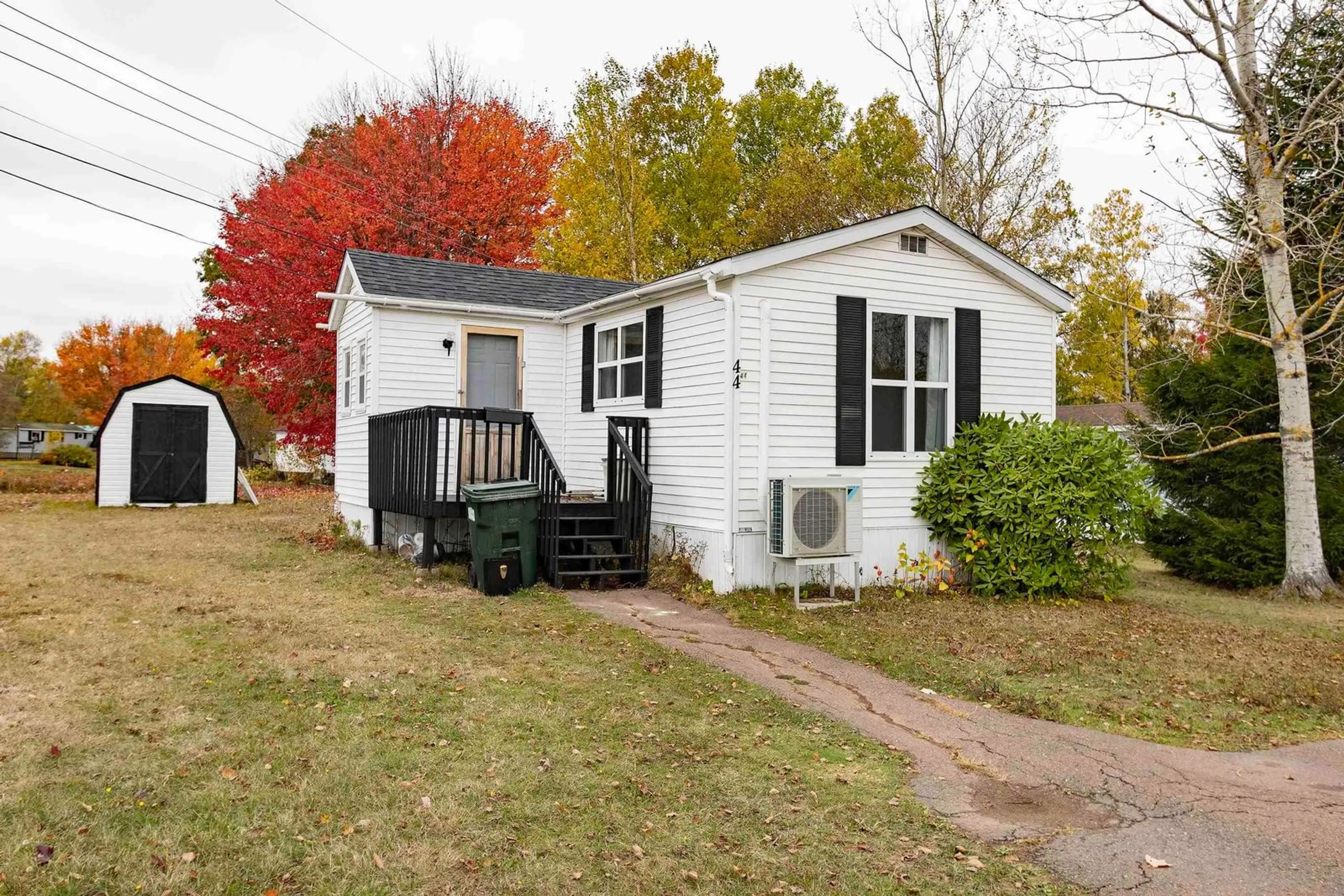 Home with vinyl exterior material, street for 44 Anson Ave, Amherst Nova Scotia B4H 4K7