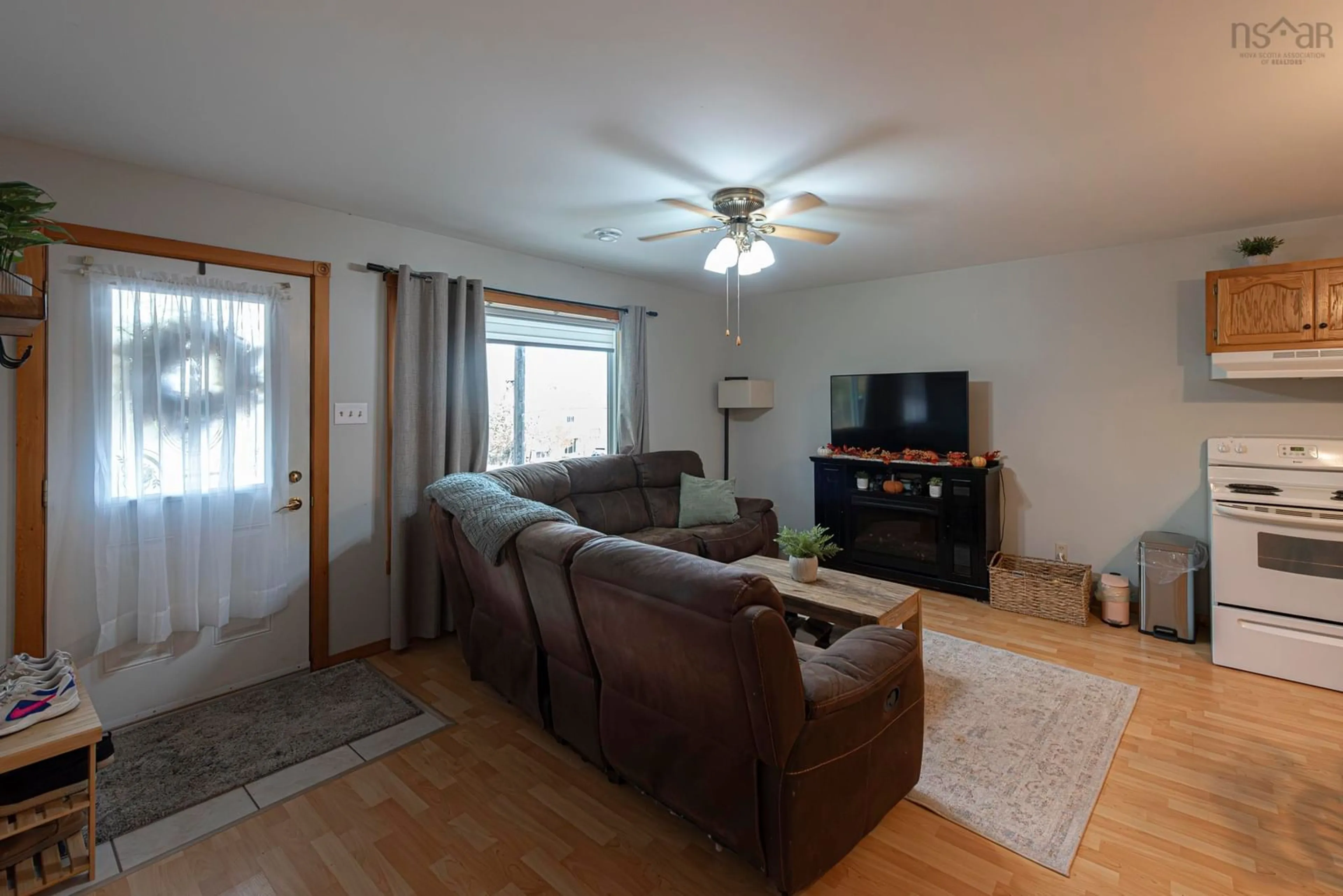 Living room with furniture, wood/laminate floor for 157 North Ave, New Glasgow Nova Scotia B2H 2E2