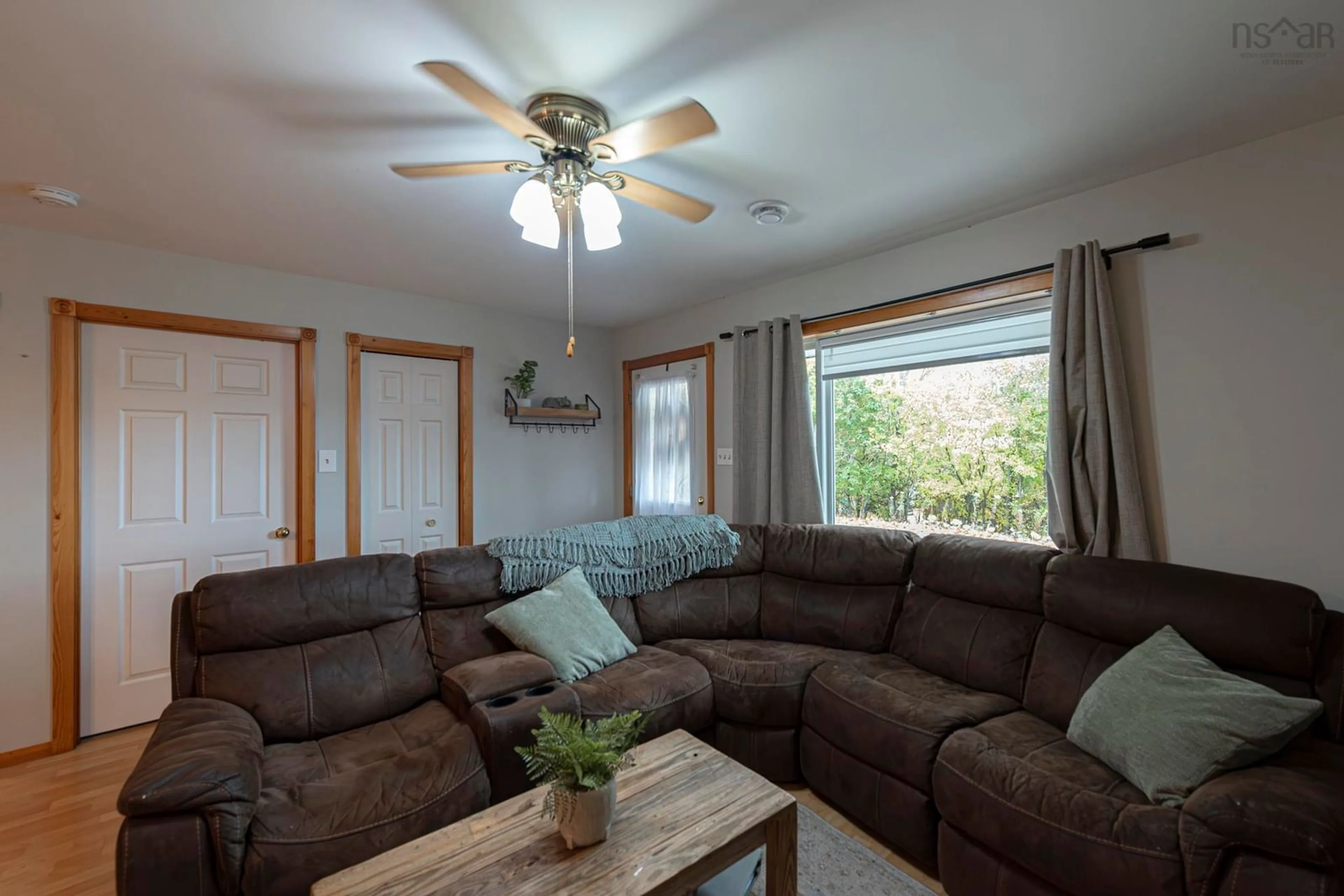 Living room with furniture, wood/laminate floor for 157 North Ave, New Glasgow Nova Scotia B2H 2E2