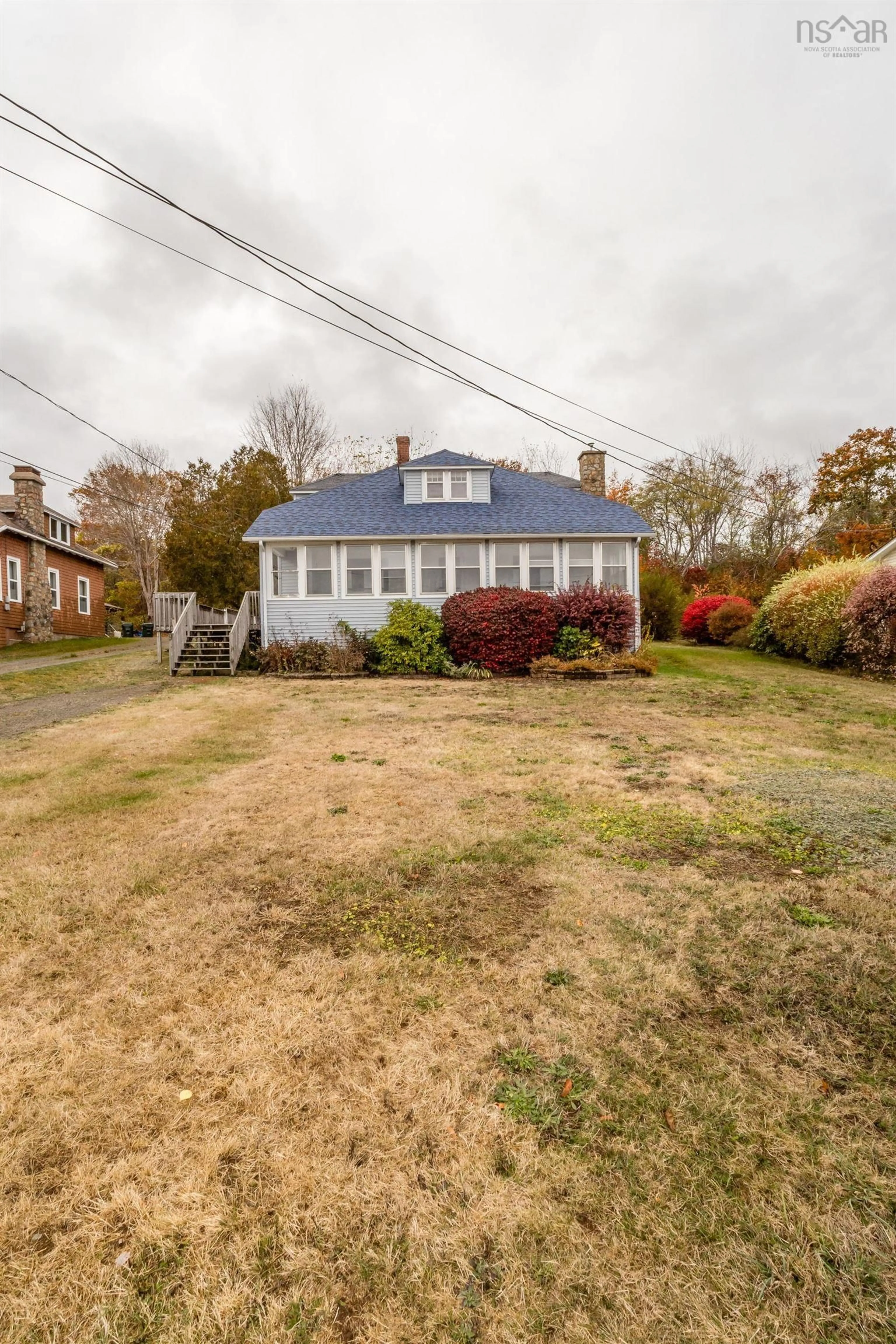 A pic from outside/outdoor area/front of a property/back of a property/a pic from drone, street for 9 Shore Rd, Digby Nova Scotia B0V 1A0