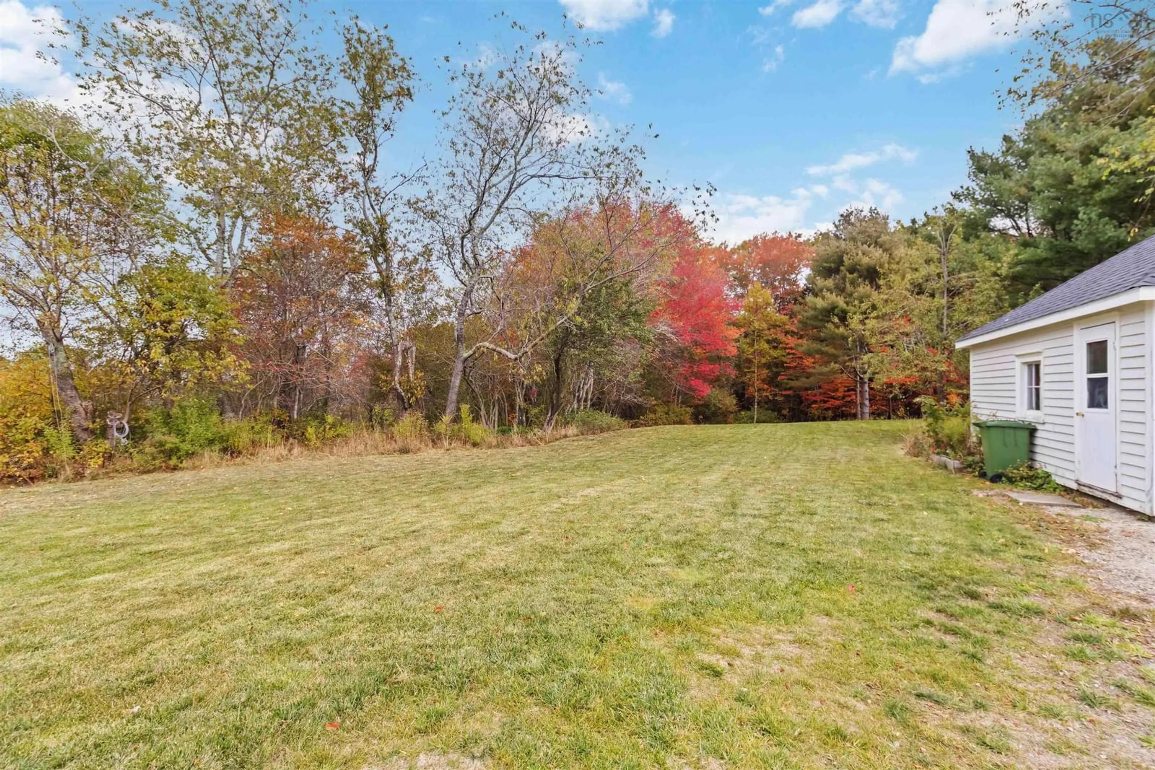 A pic from outside/outdoor area/front of a property/back of a property/a pic from drone, forest/trees view for 2571 Highway 331, West Lahave Nova Scotia B0R 1G0
