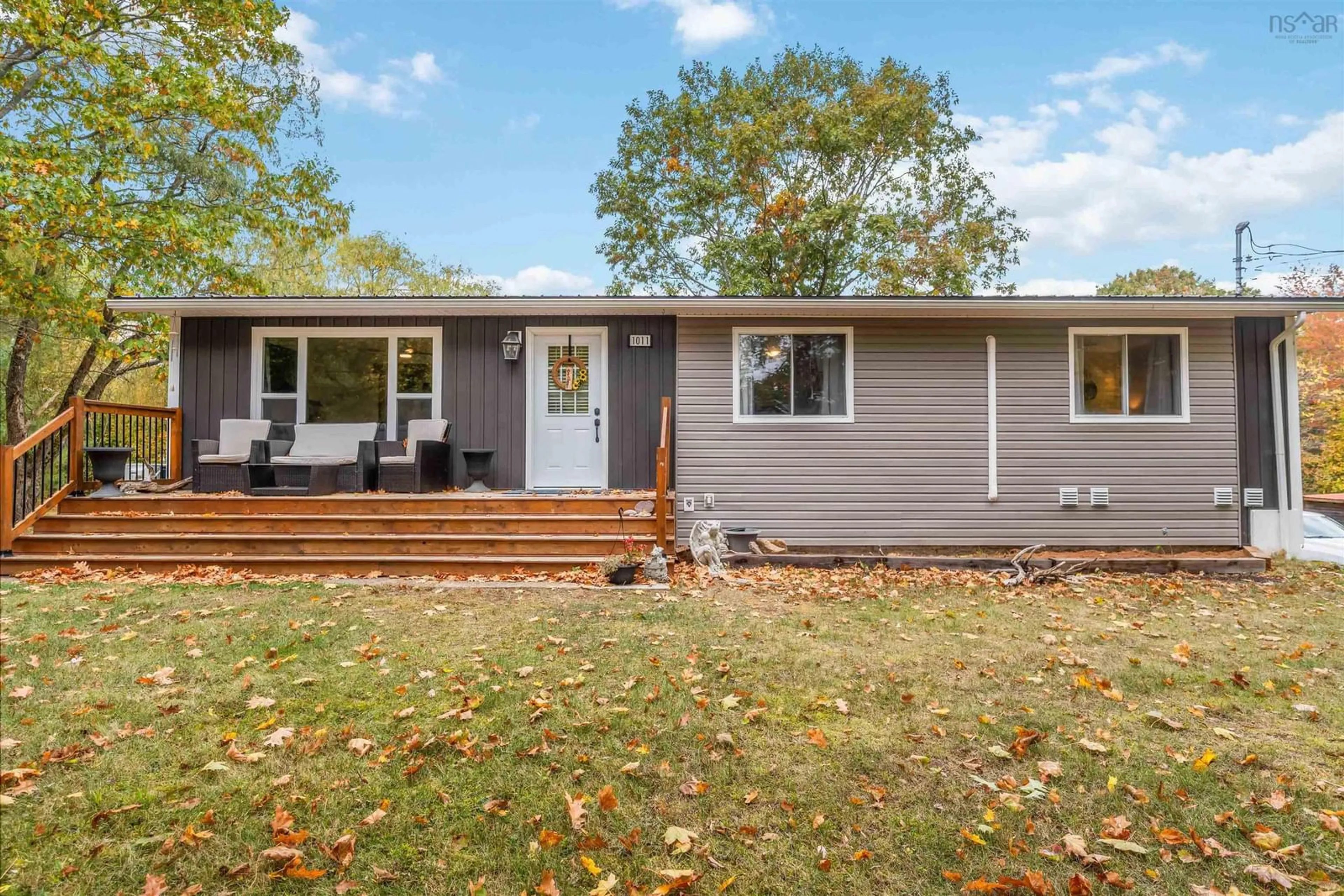 Home with vinyl exterior material, street for 1011 Lone Pine Dr, Centreville Nova Scotia B0P 1J0
