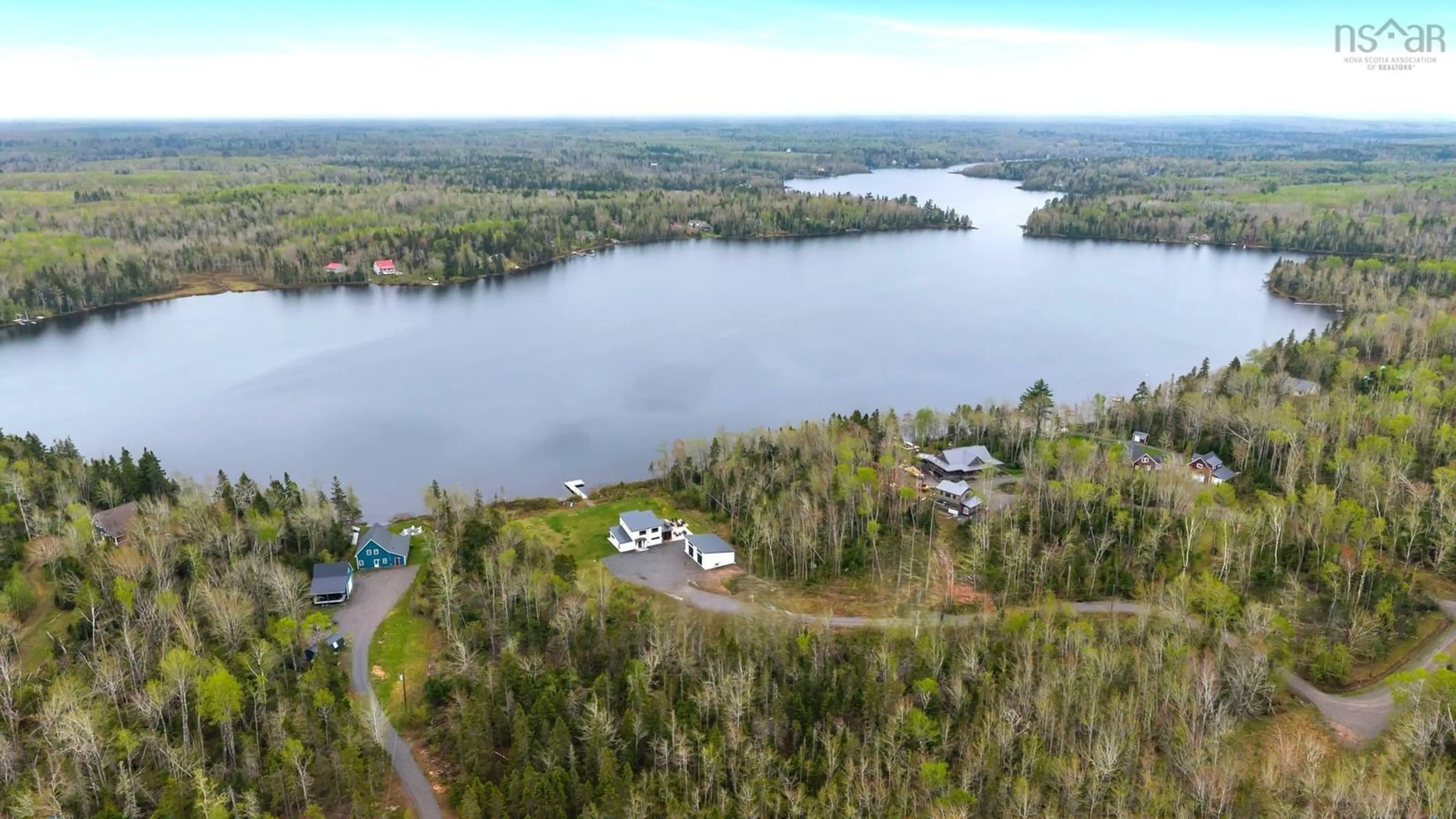A pic from outside/outdoor area/front of a property/back of a property/a pic from drone, water/lake/river/ocean view for 1127 Lake Rd, Mattatall Lake Nova Scotia B0M 1Z0