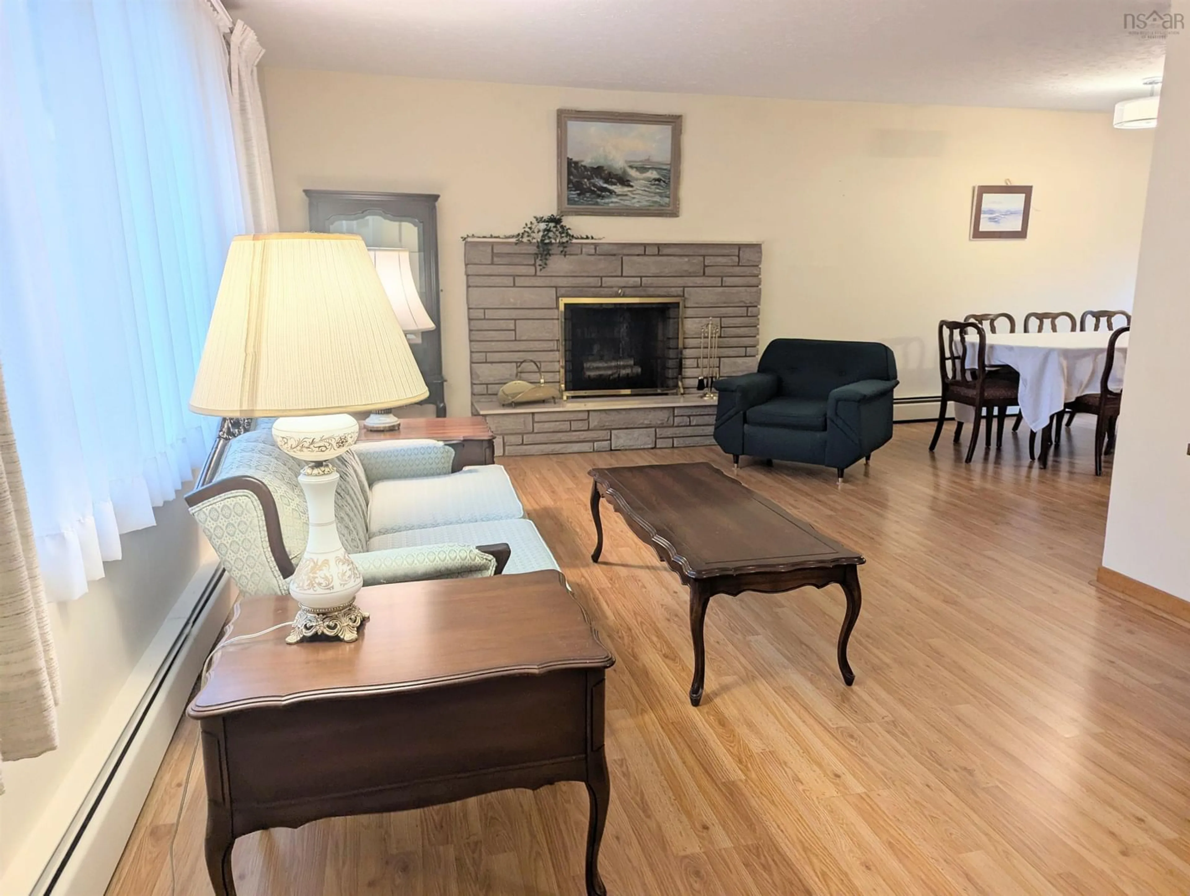 Living room with furniture, wood/laminate floor for 984 Herring Cove Rd, Herring Cove Nova Scotia B3R 1Z6