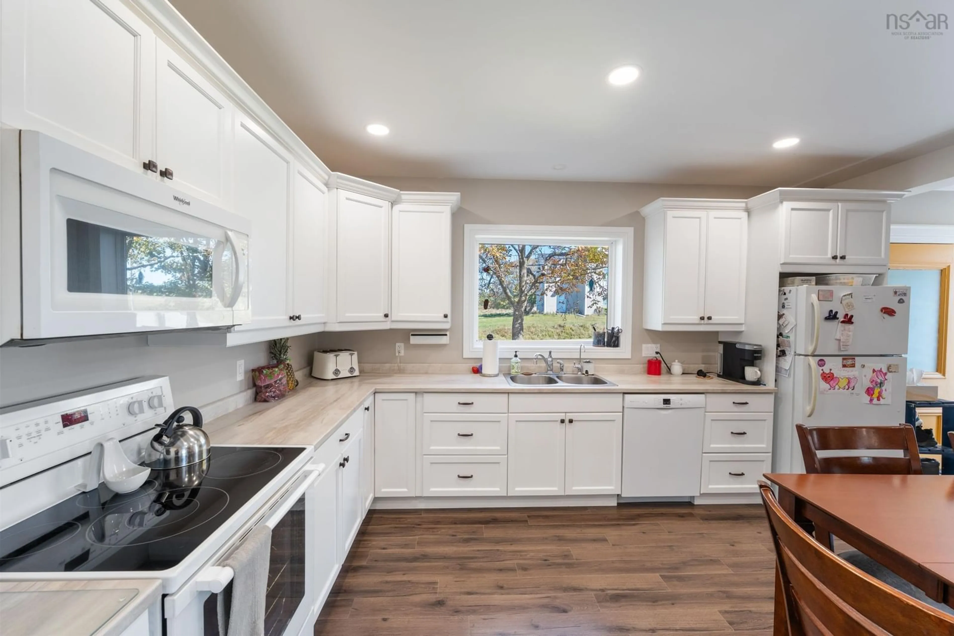Open concept kitchen, ceramic/tile floor for 223-225 Forest St, Yarmouth Nova Scotia B5A 5H4