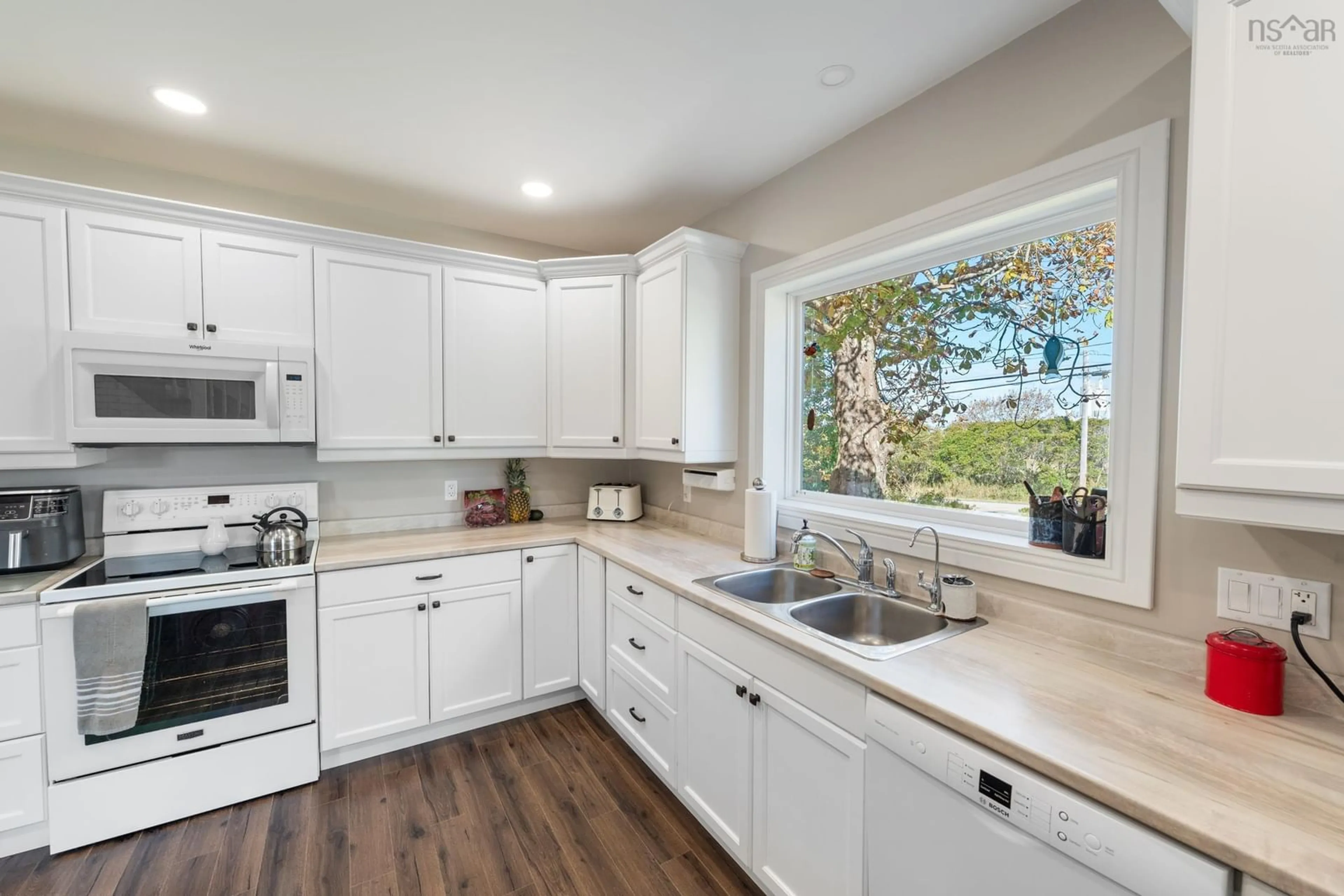 Open concept kitchen, ceramic/tile floor for 223-225 Forest St, Yarmouth Nova Scotia B5A 5H4