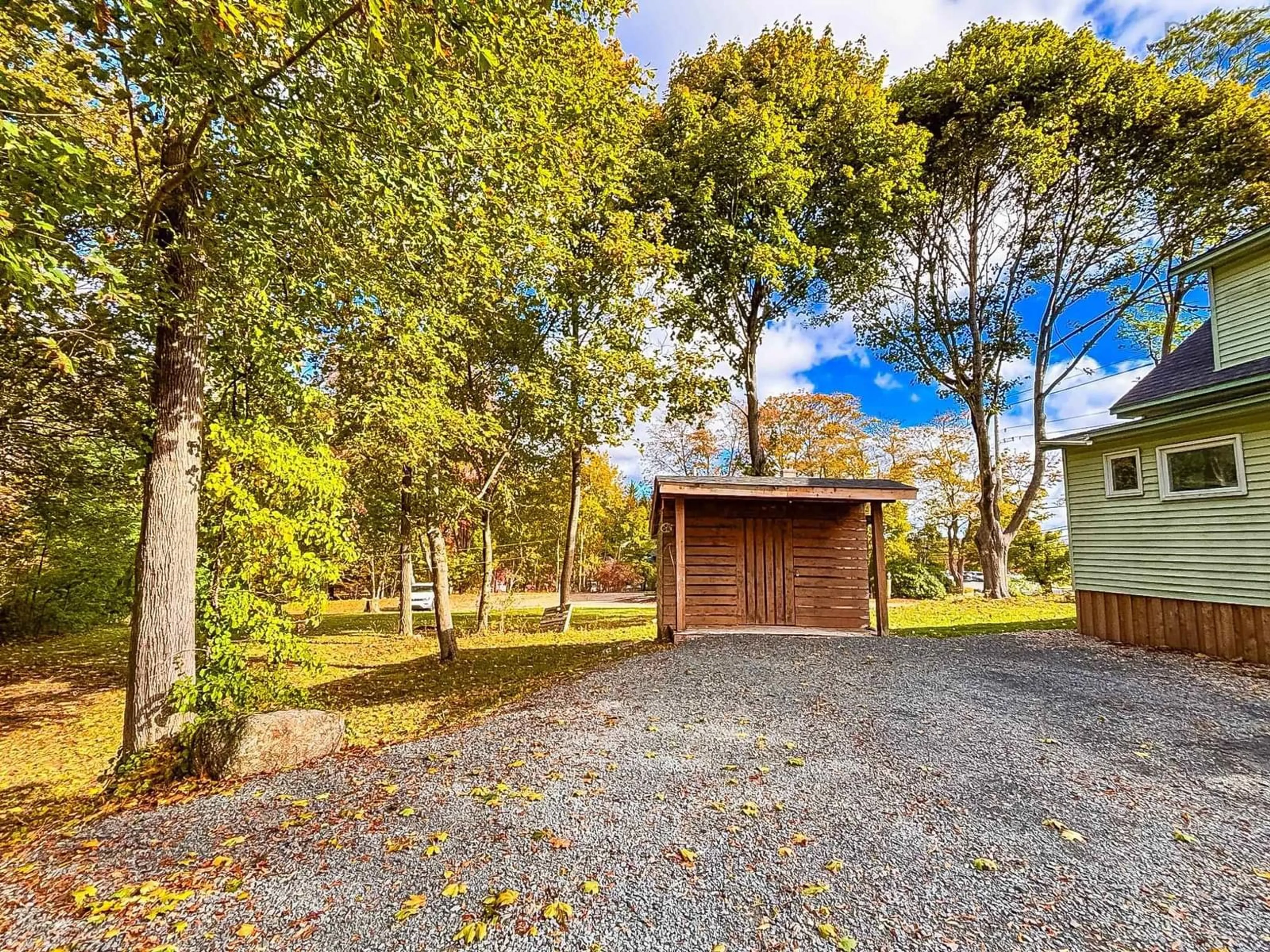 A pic from outside/outdoor area/front of a property/back of a property/a pic from drone, forest/trees view for 186 Dufferin St, Bridgewater Nova Scotia B4V 2G7