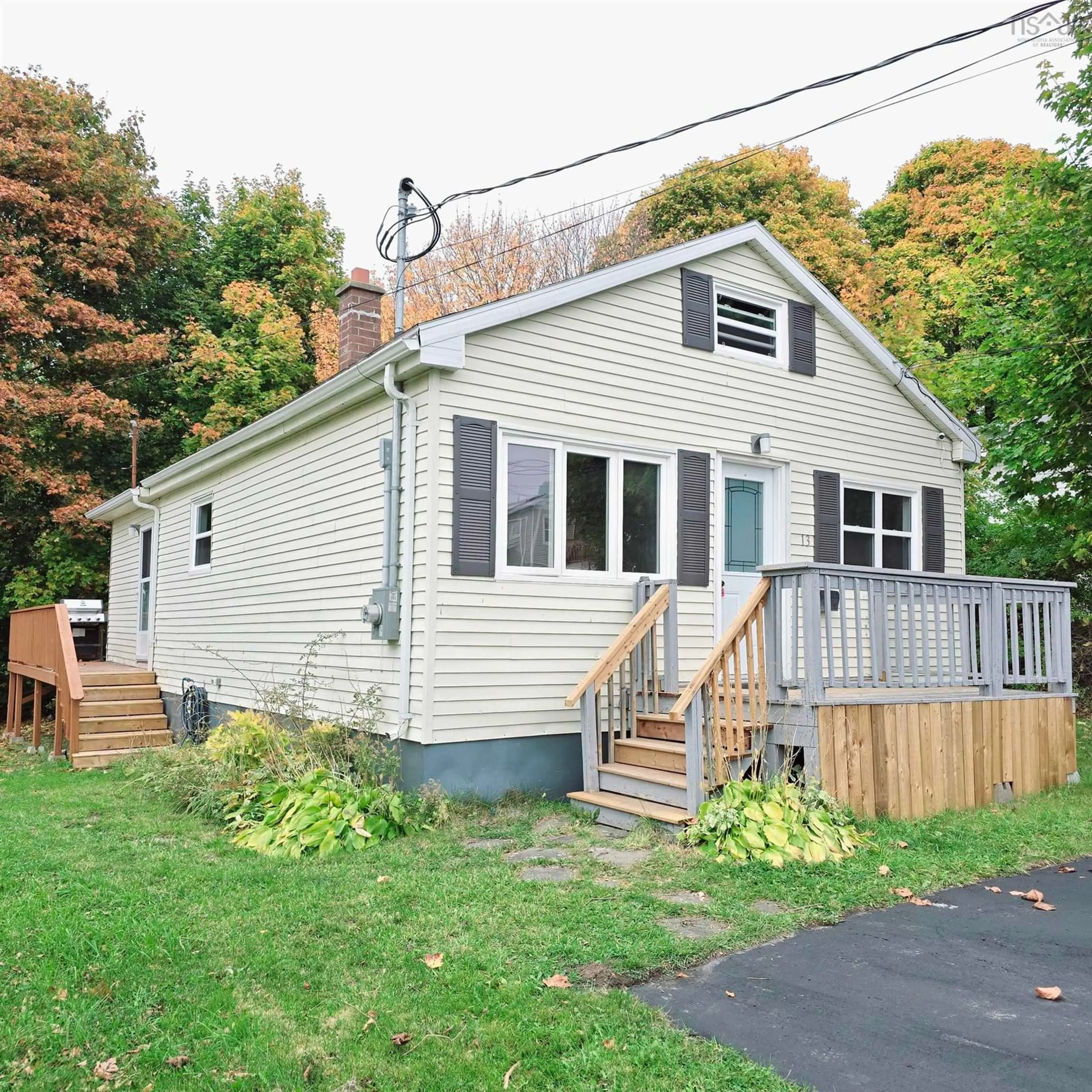 Home with vinyl exterior material, street for 13 Gisborne St, North Sydney Nova Scotia B2A 2E1