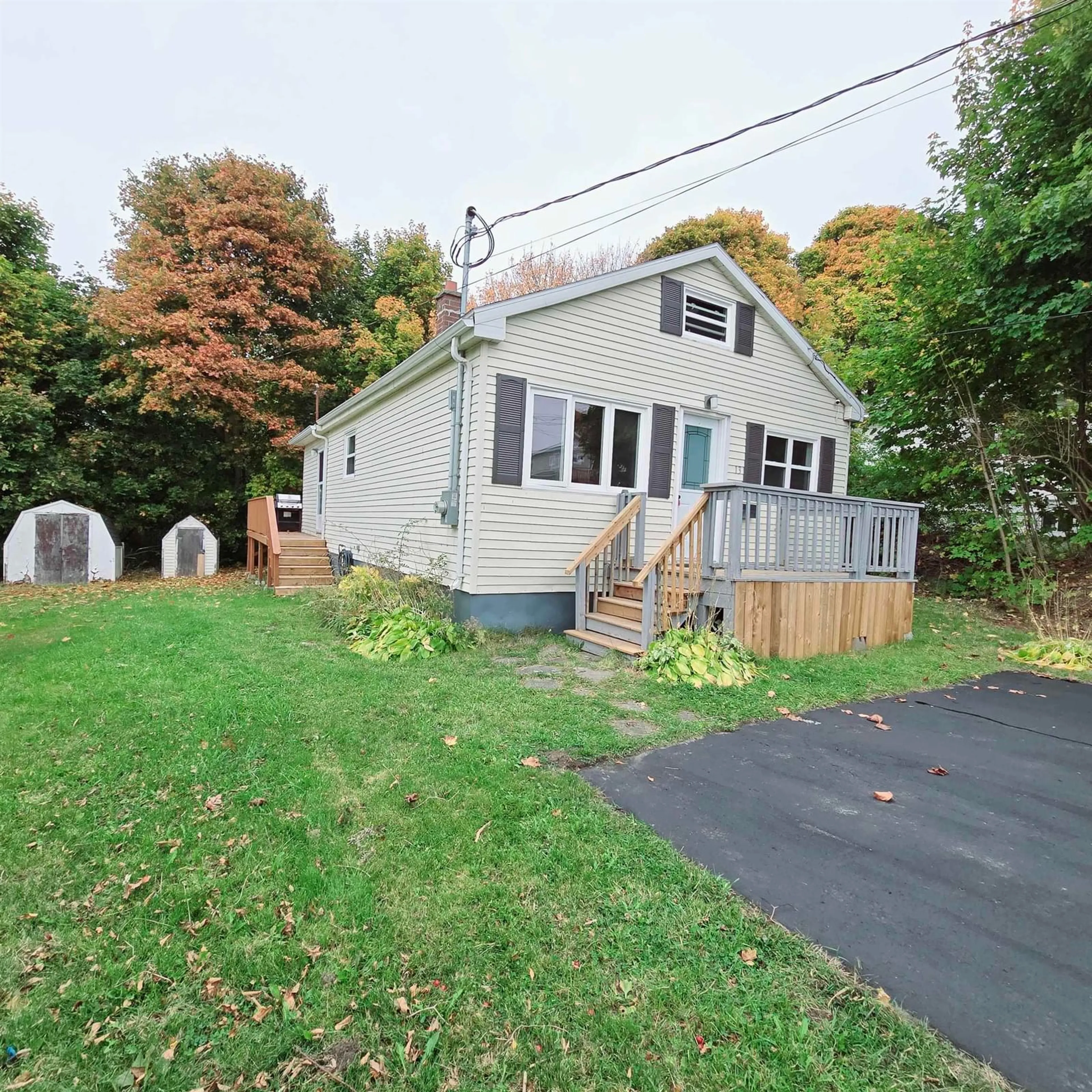 Home with vinyl exterior material, street for 13 Gisborne St, North Sydney Nova Scotia B2A 2E1