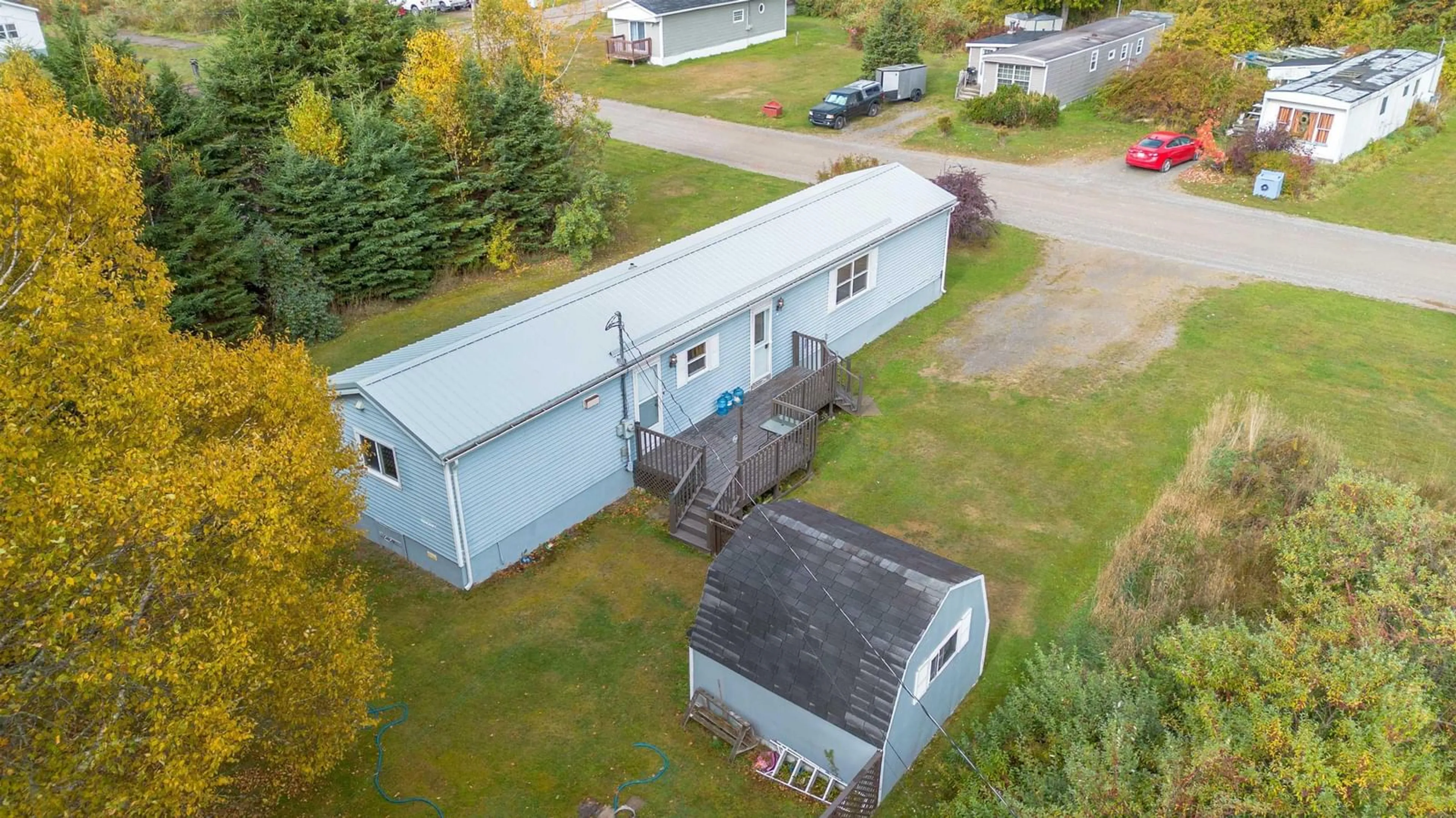 A pic from outside/outdoor area/front of a property/back of a property/a pic from drone, unknown for 6 Second St, Northside East Bay Nova Scotia B1J 1B4