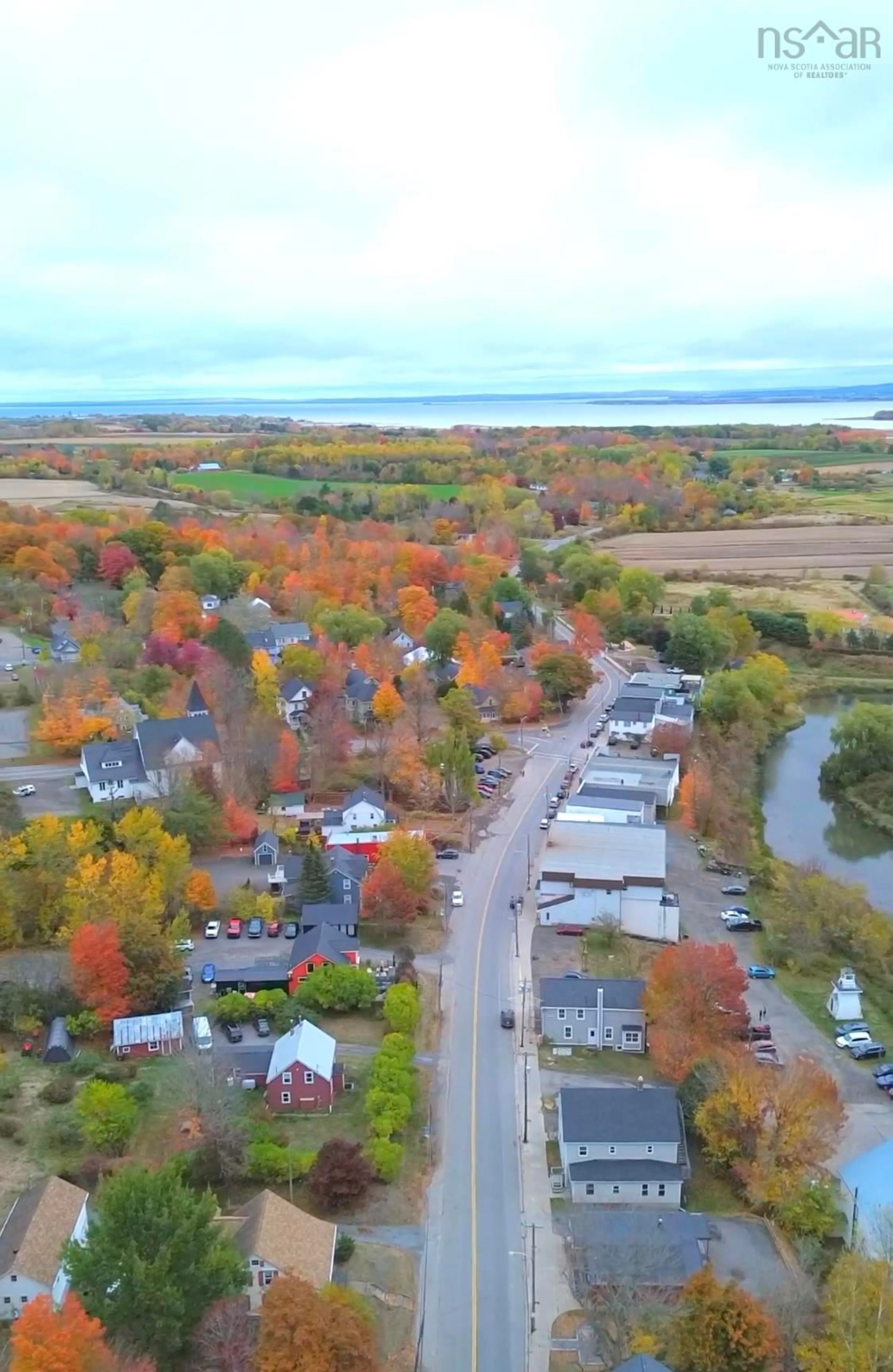 A pic from outside/outdoor area/front of a property/back of a property/a pic from drone, water/lake/river/ocean view for 9800 Main St, Canning Nova Scotia B0P 1H0