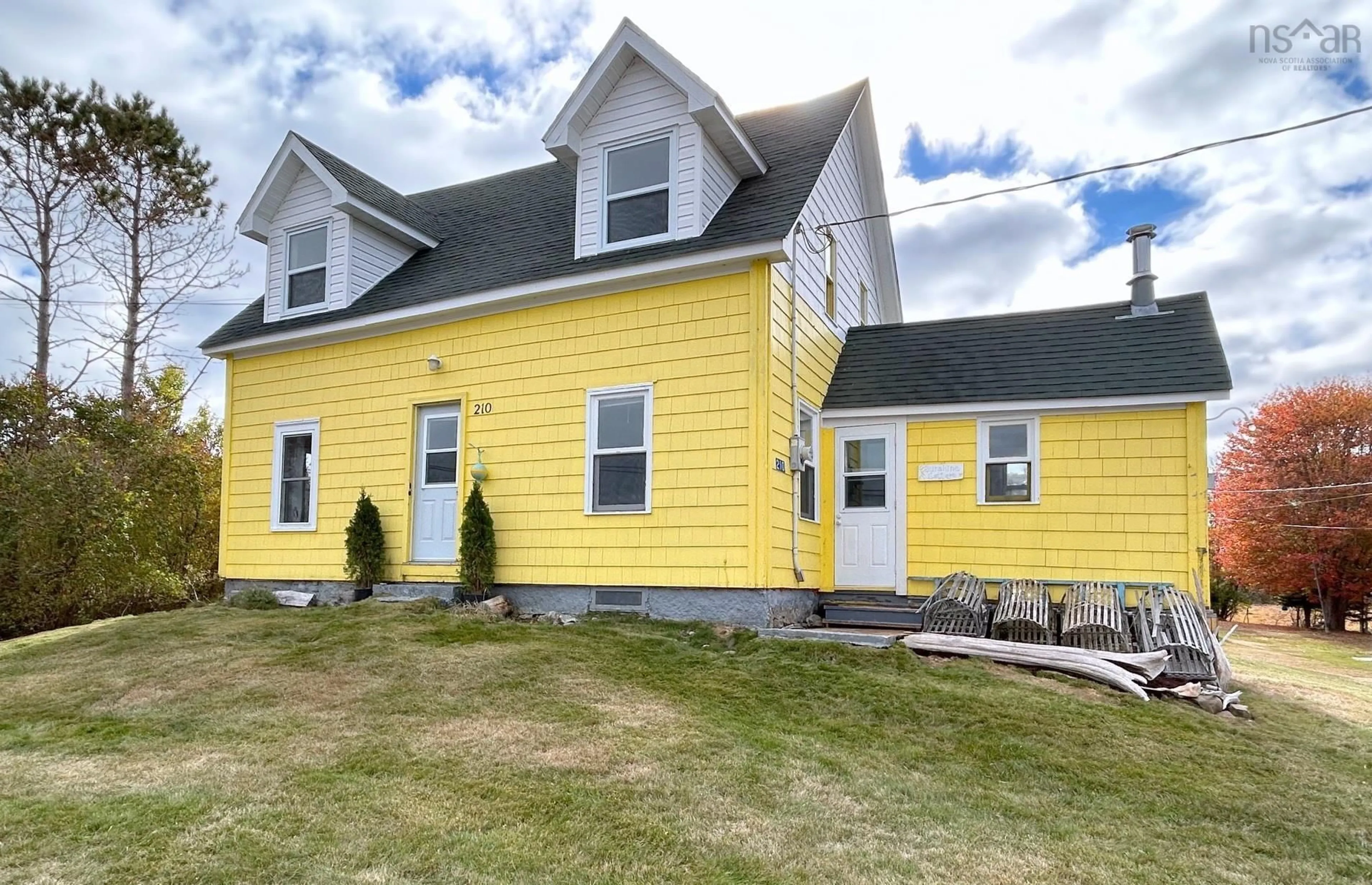 Home with vinyl exterior material, street for 210 Martins Point Rd, Martins Point Nova Scotia B0J 2E0