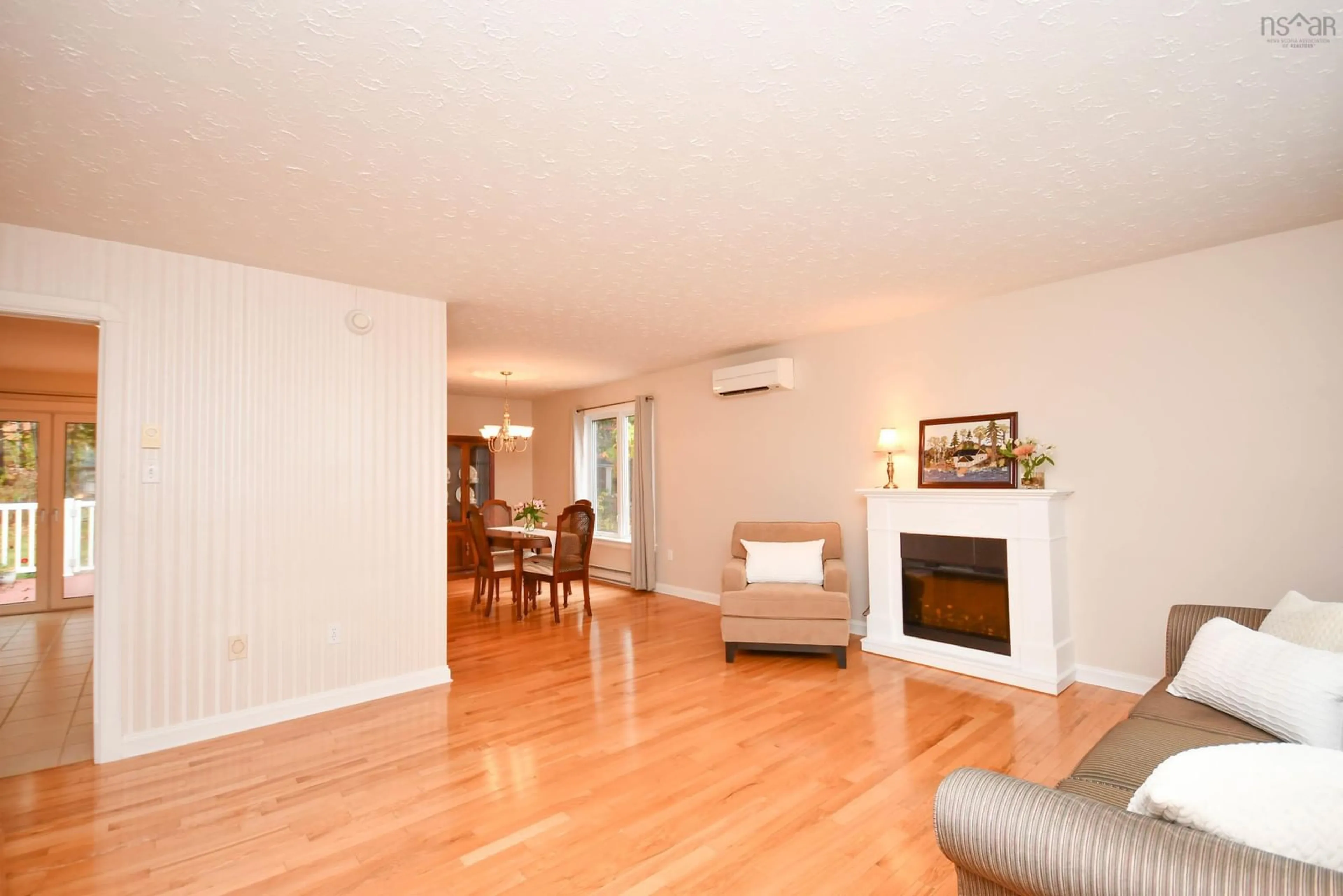Living room with furniture, wood/laminate floor for 70 Portland Estates Blvd, Dartmouth Nova Scotia B2W 6E5